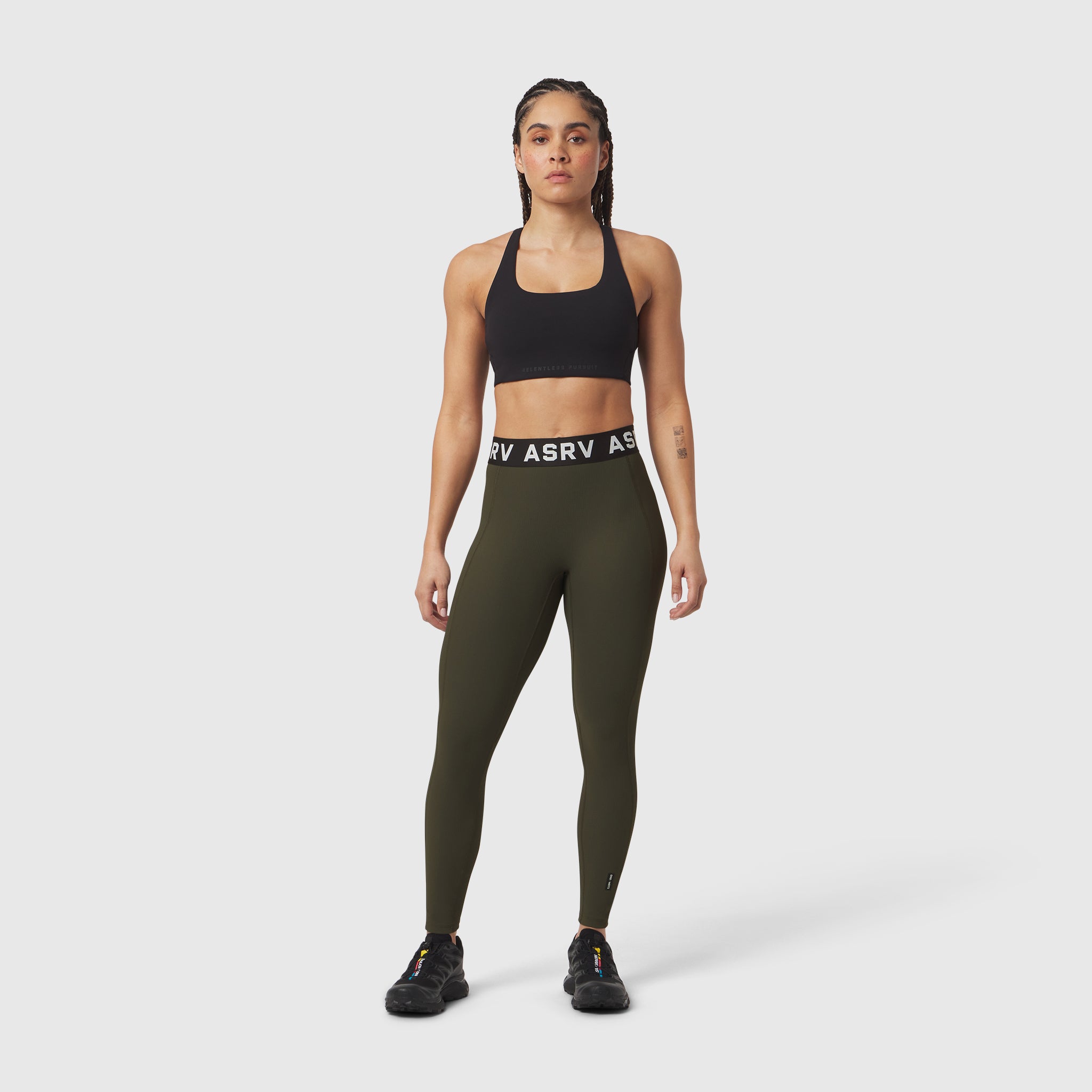 W071 Lycra Ribbed Legging in olive, worn by model standing facing camera