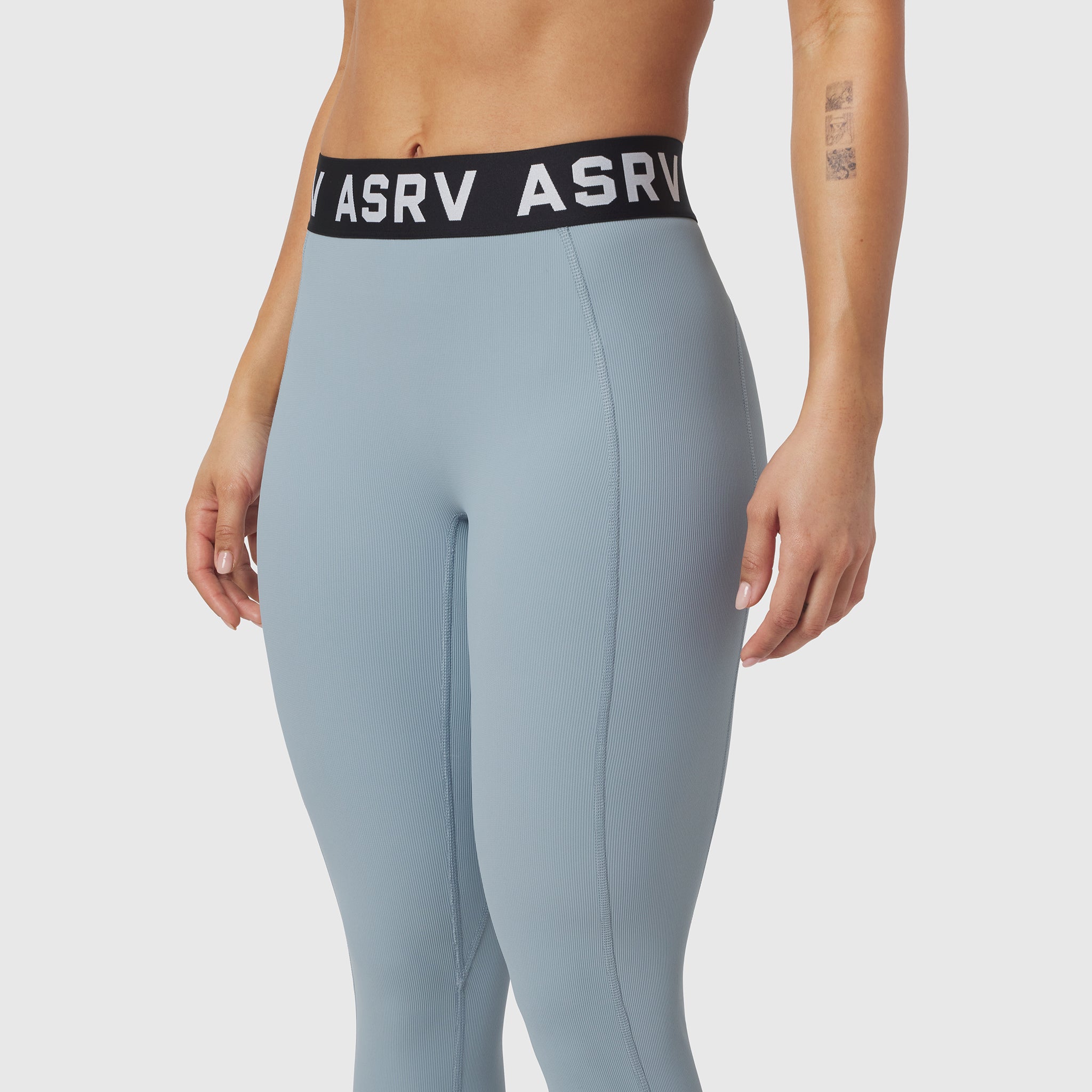 W071 Lycra Ribbed Legging in light sky worn by model, waist-down view