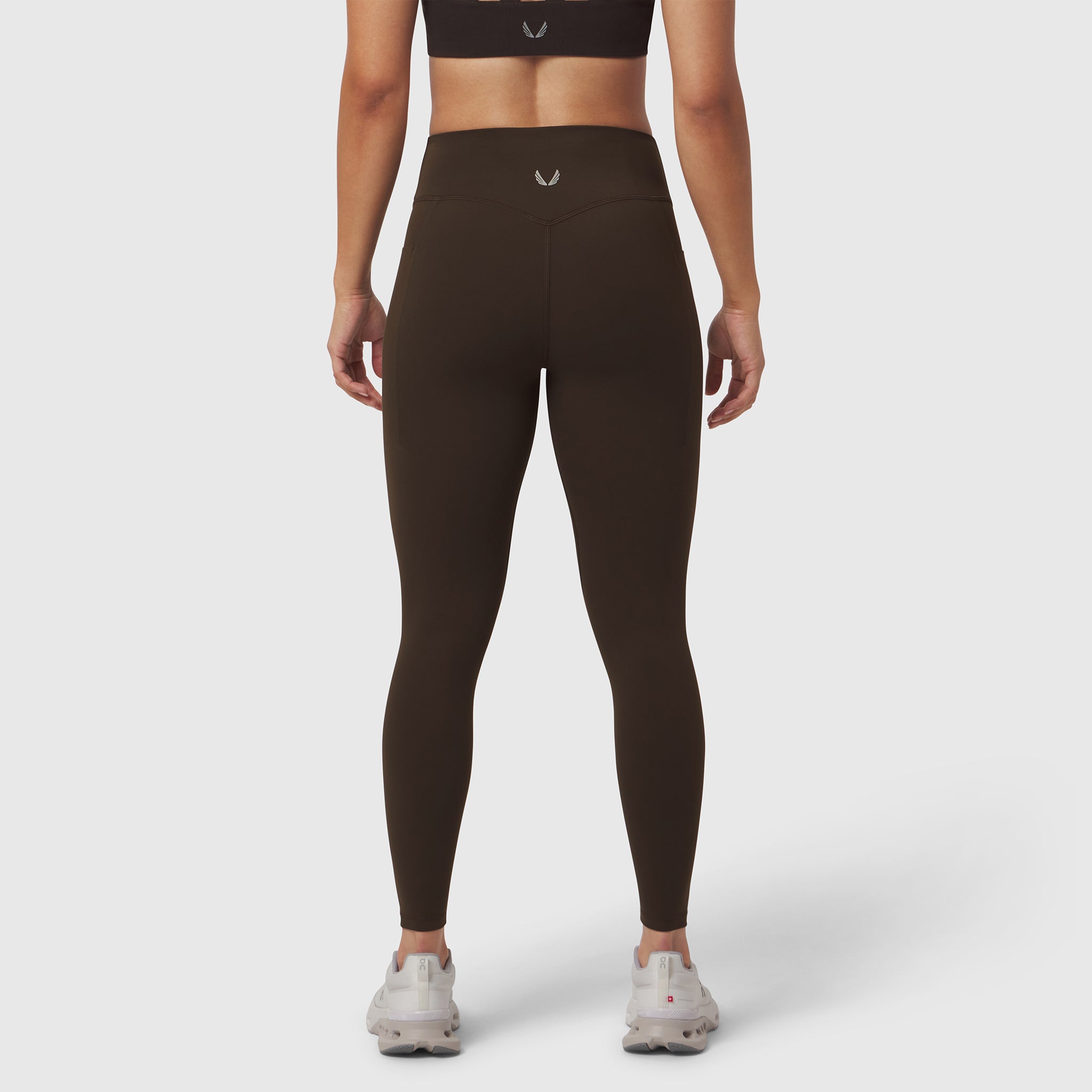 W072 LYCRA® ADAPTIV 4 Pocket Legging in Dark Earth, back view on model