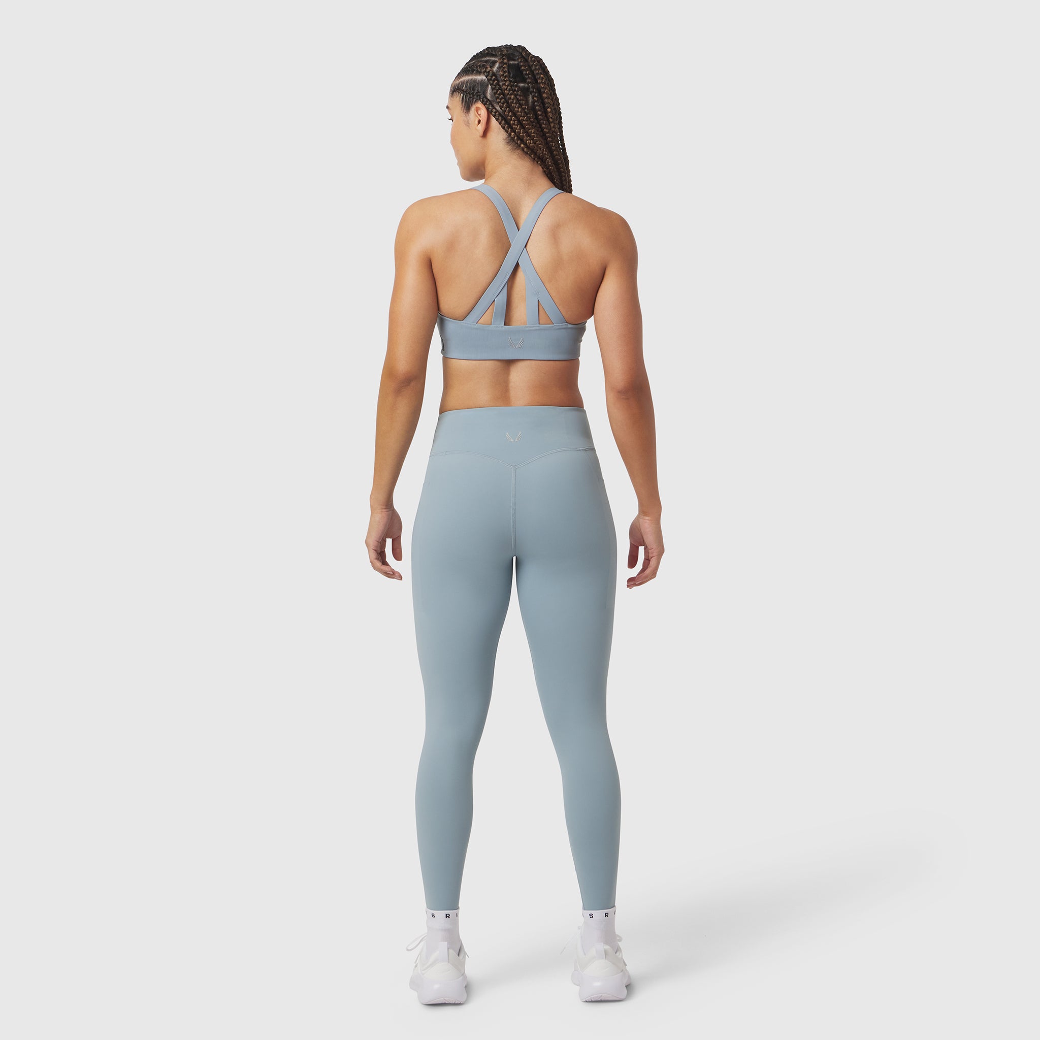 W072 LYCRA® ADAPTIV 4 Pocket Legging in light sky, back view on model