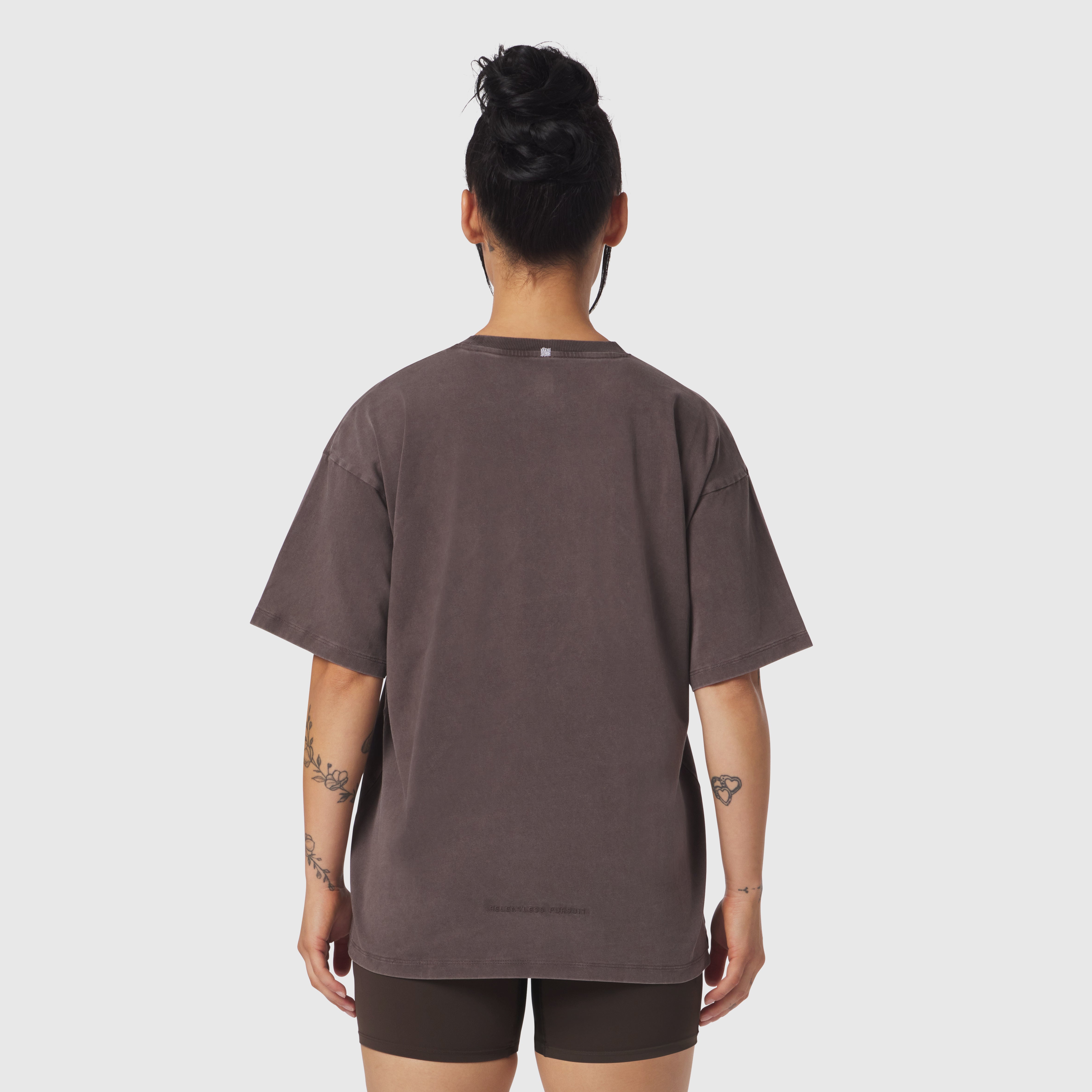 Distressed Relaxed Tee in Dark Earth, back view on model