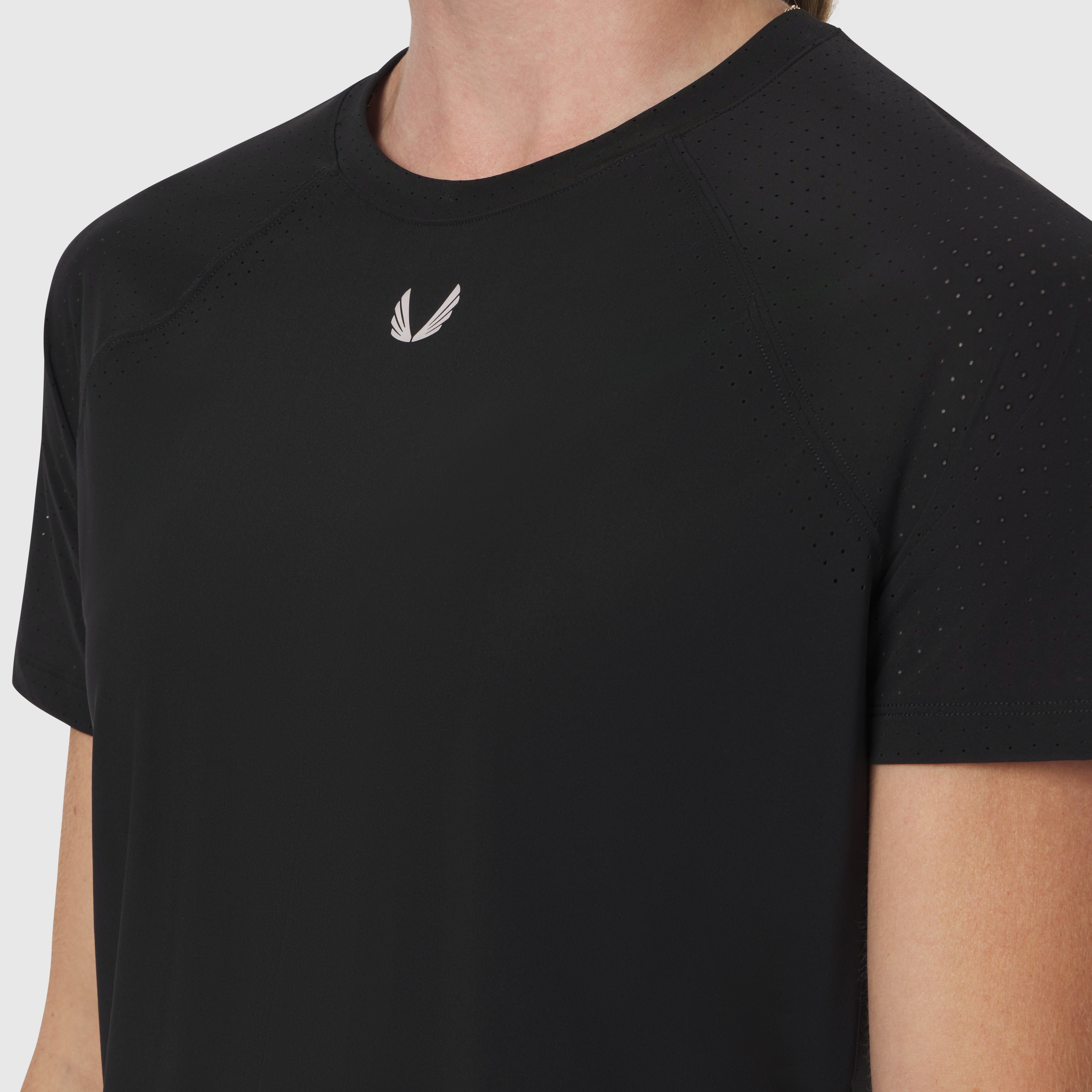 Black Laser-Vent Established Tee worn by model, front view showing white logo