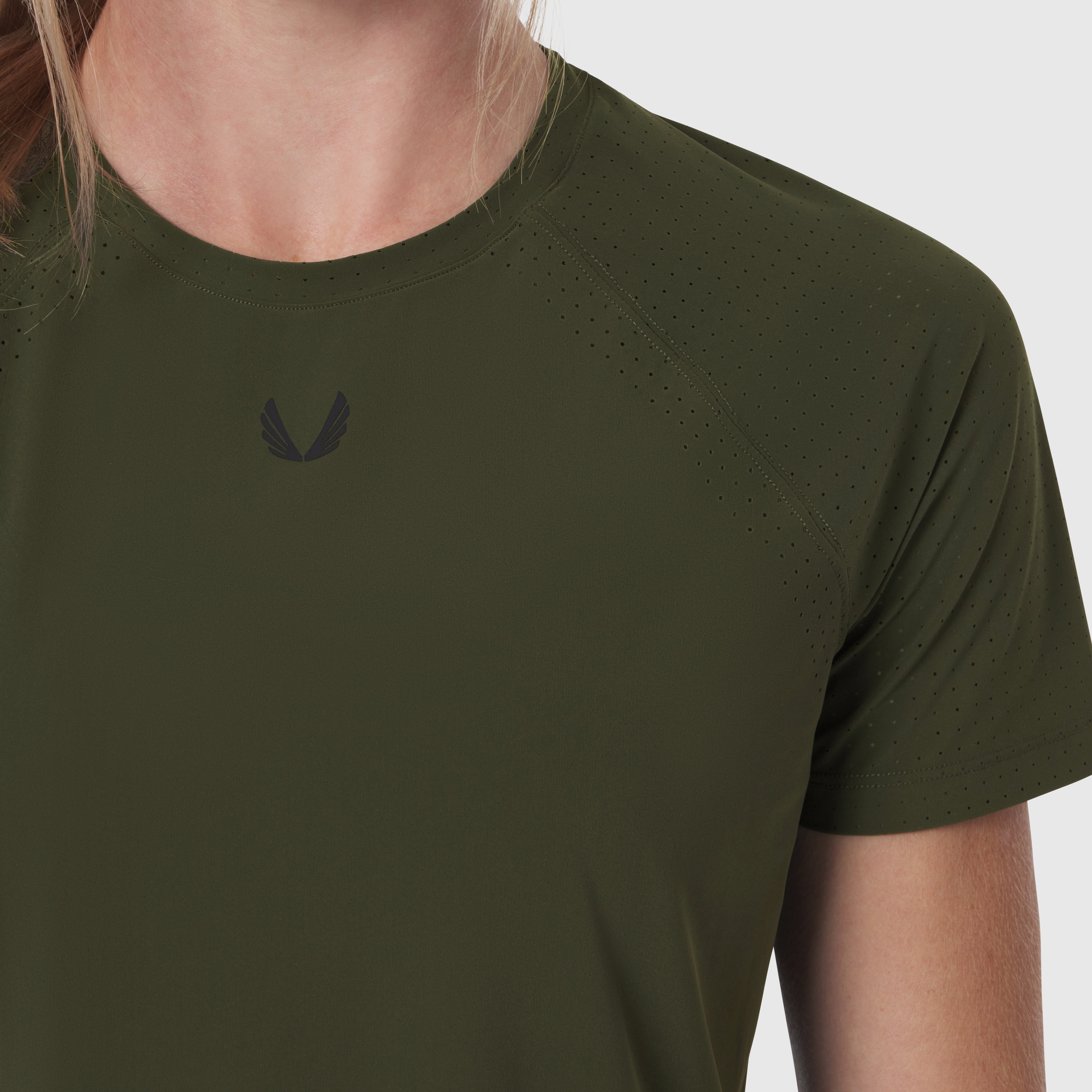 Laser-Vent Established Tee in olive green worn by model, front view closeup