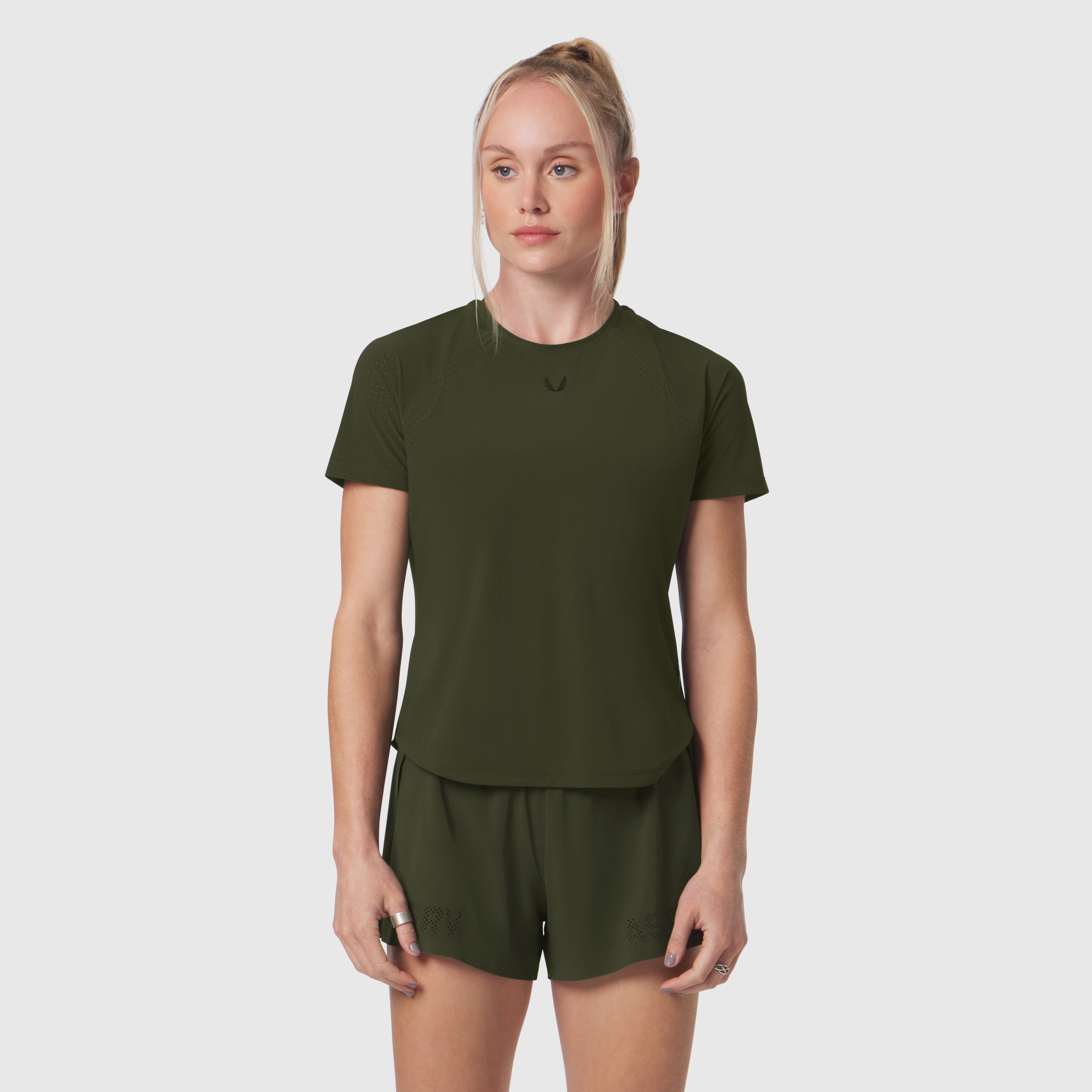 Laser-Vent Established Tee in olive paired with matching shorts, worn by model facing camera