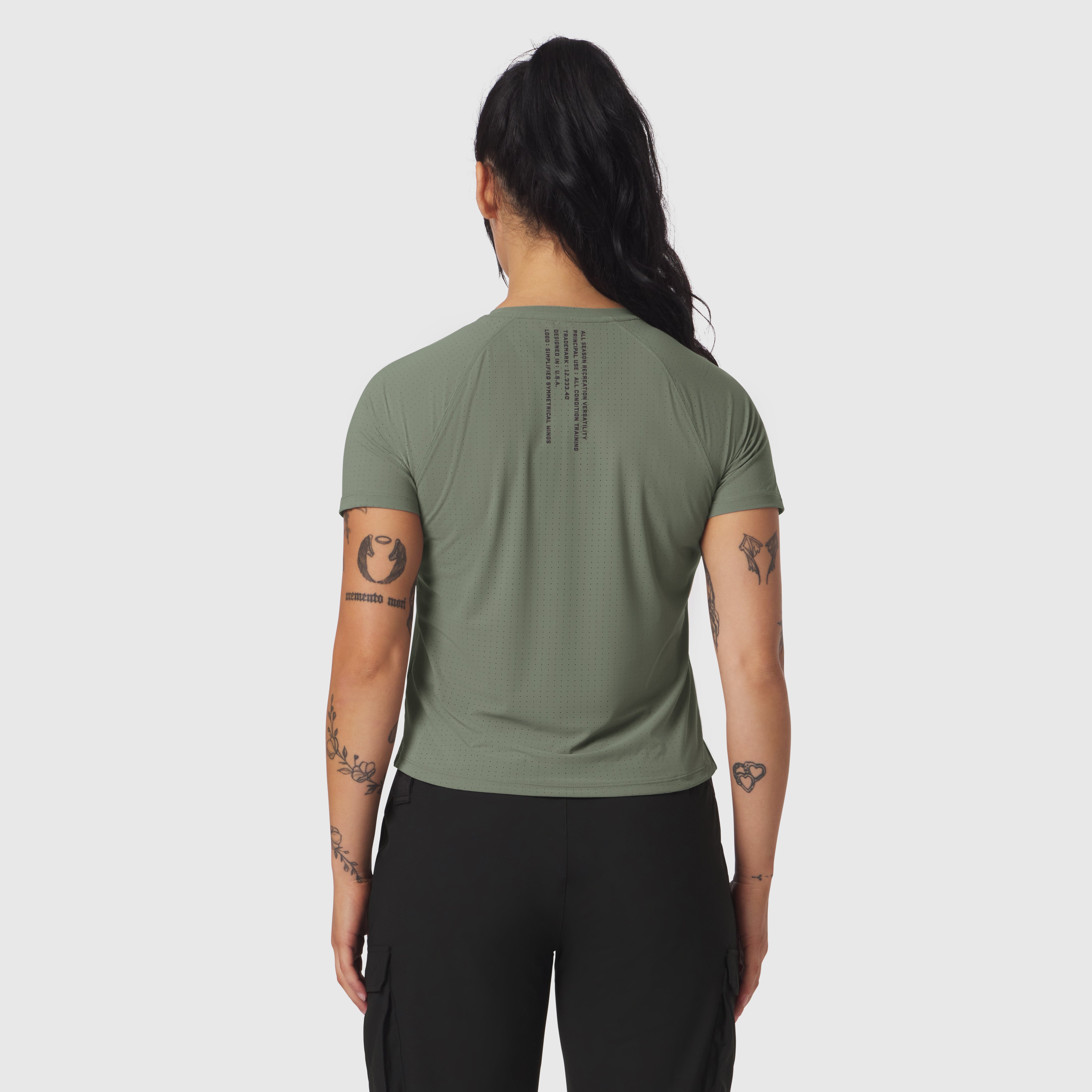Laser-Vent Established Tee in sage, worn by model, back view
