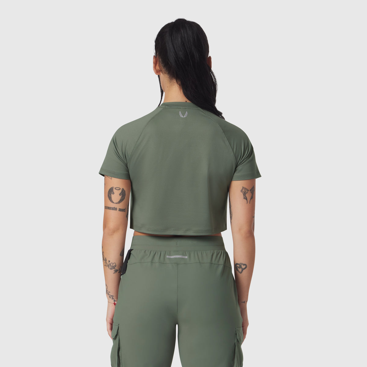 AeroSilver Cropped Tee in sage, back view on model