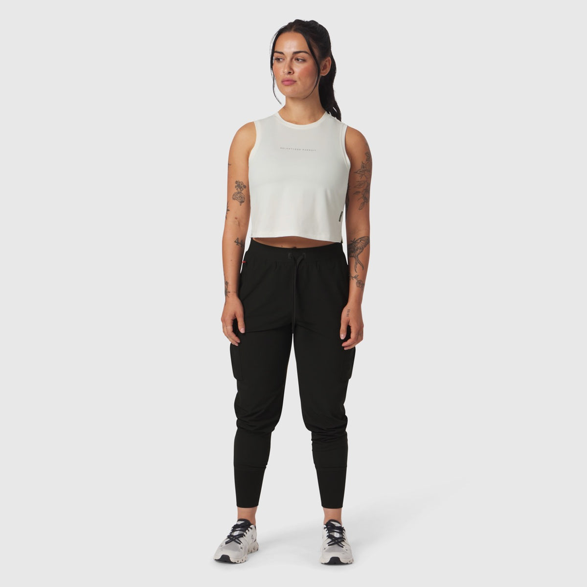 AeroSilver Tank Top in ivory cream worn with black joggers, front view