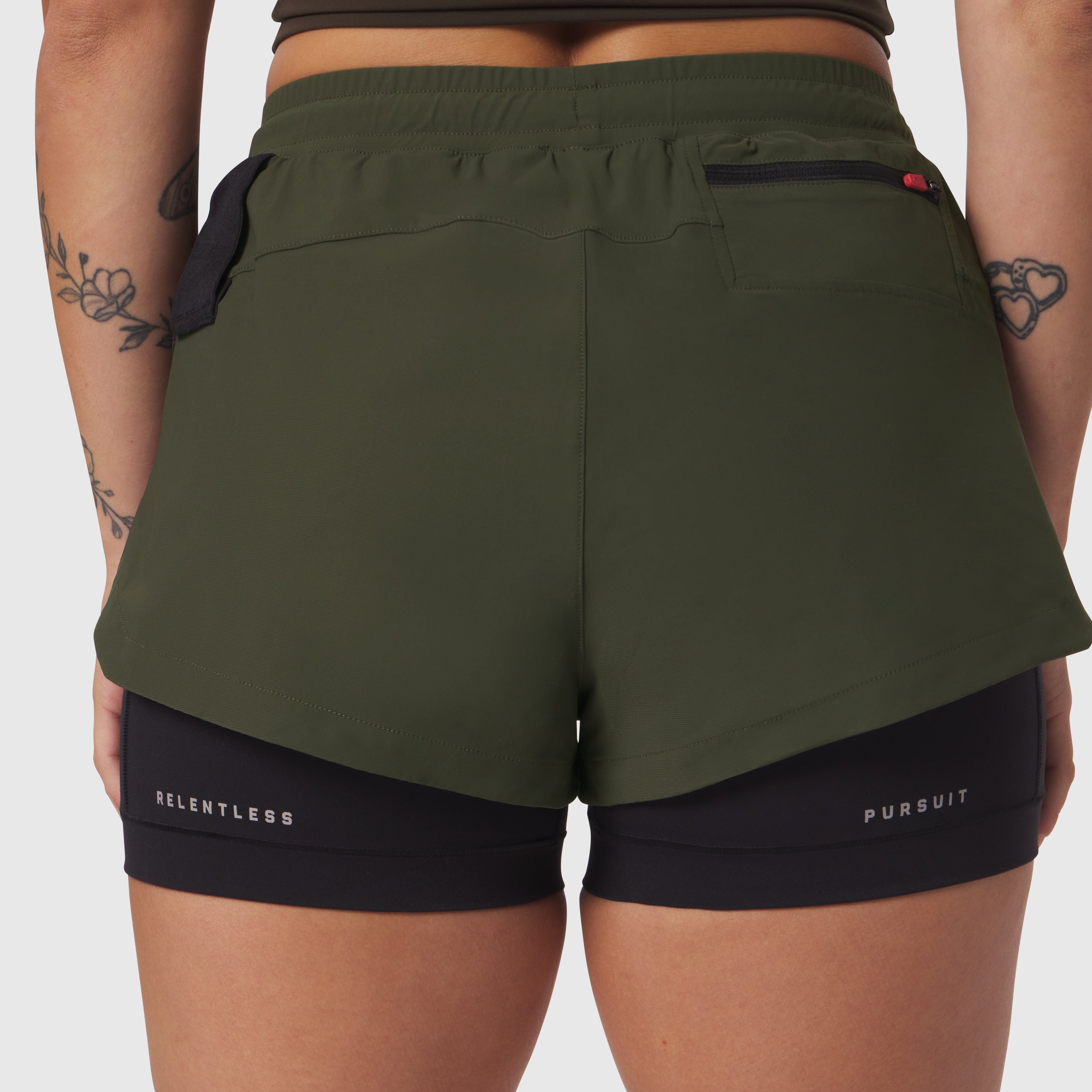 Tetra-Lite Liner Short in olive and black, back view on model