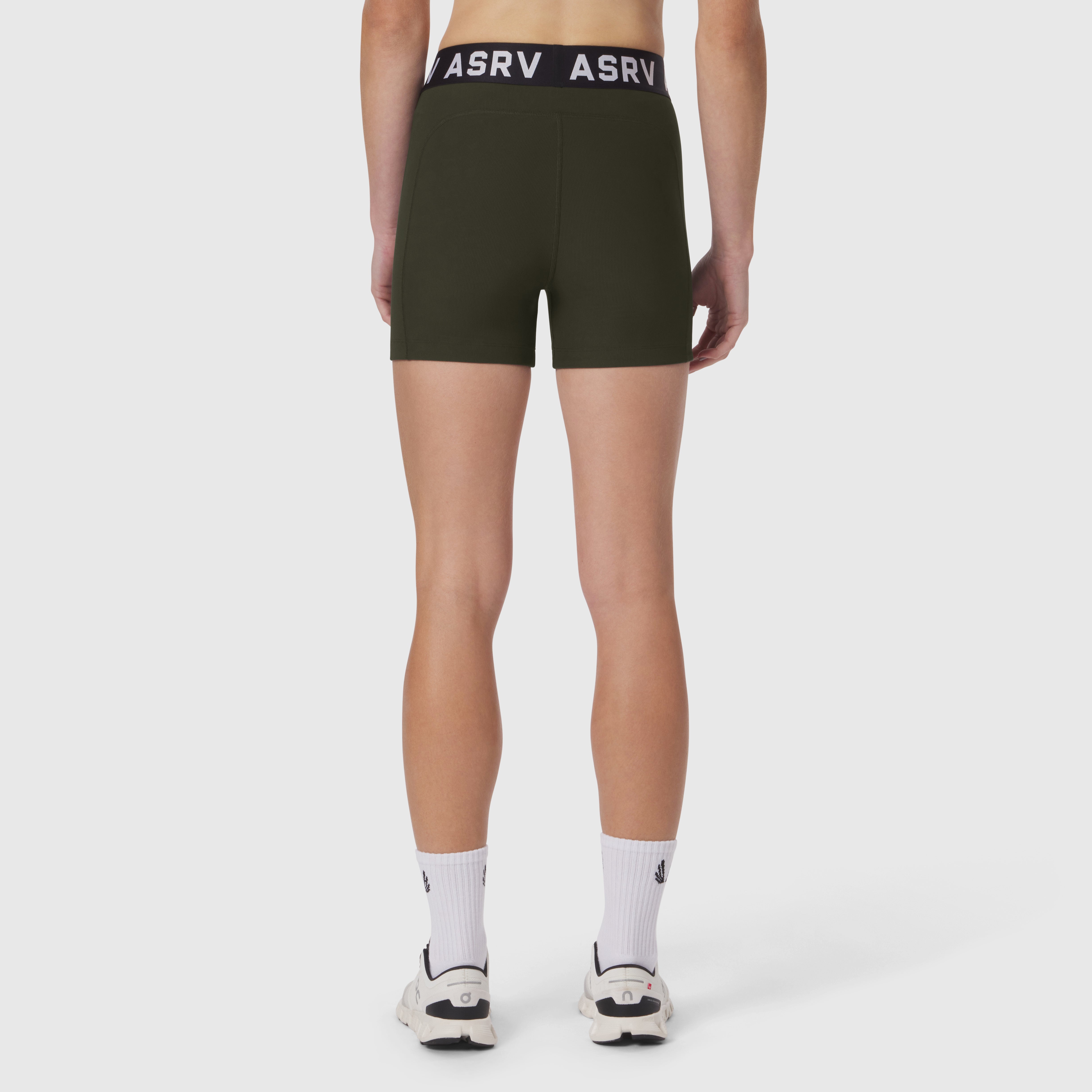 LYCRA® Ribbed Short in olive worn by model from behind, styled with white socks and sneakers