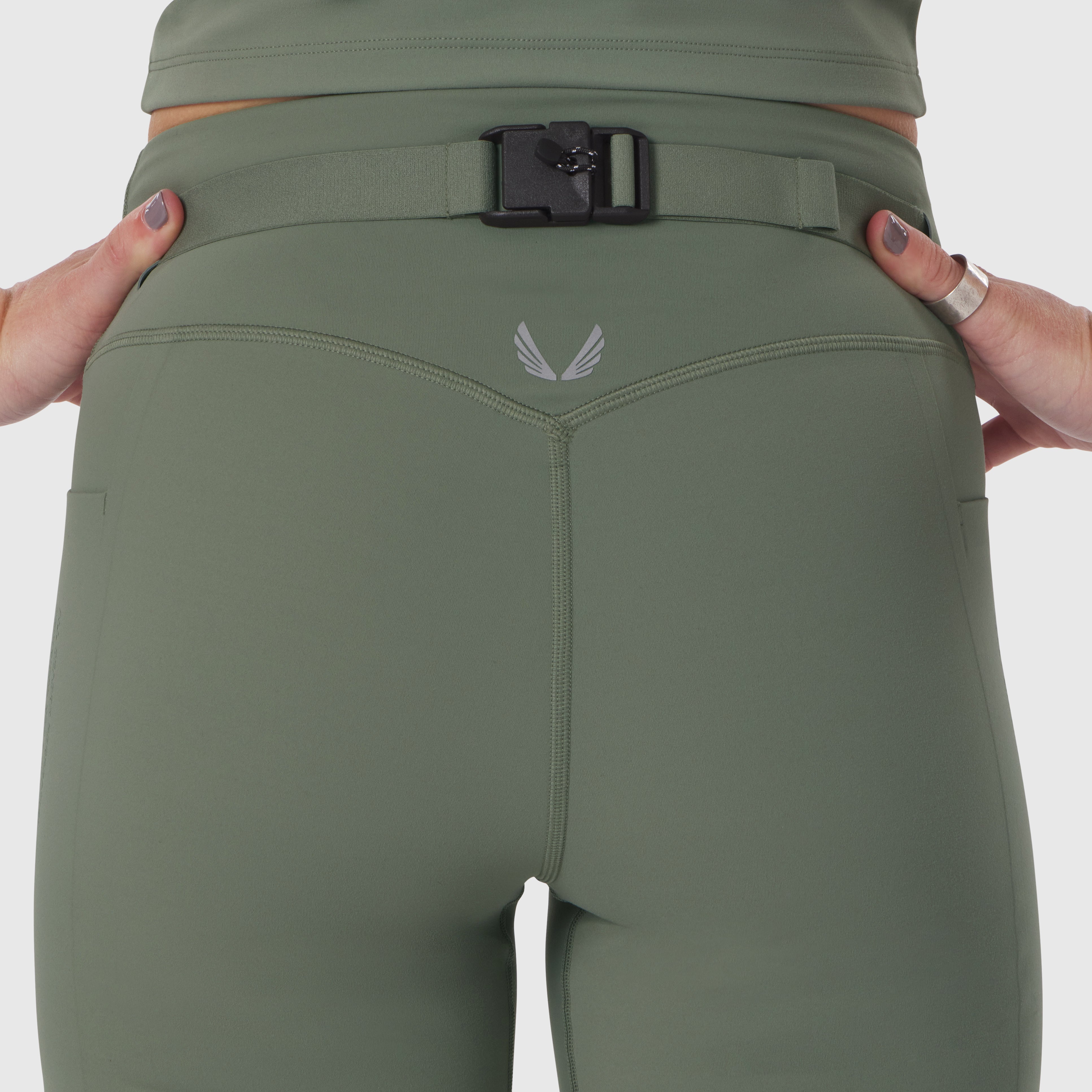 LYCRA® 3-in-1 Biker Short in sage, model wearing with hands on hips