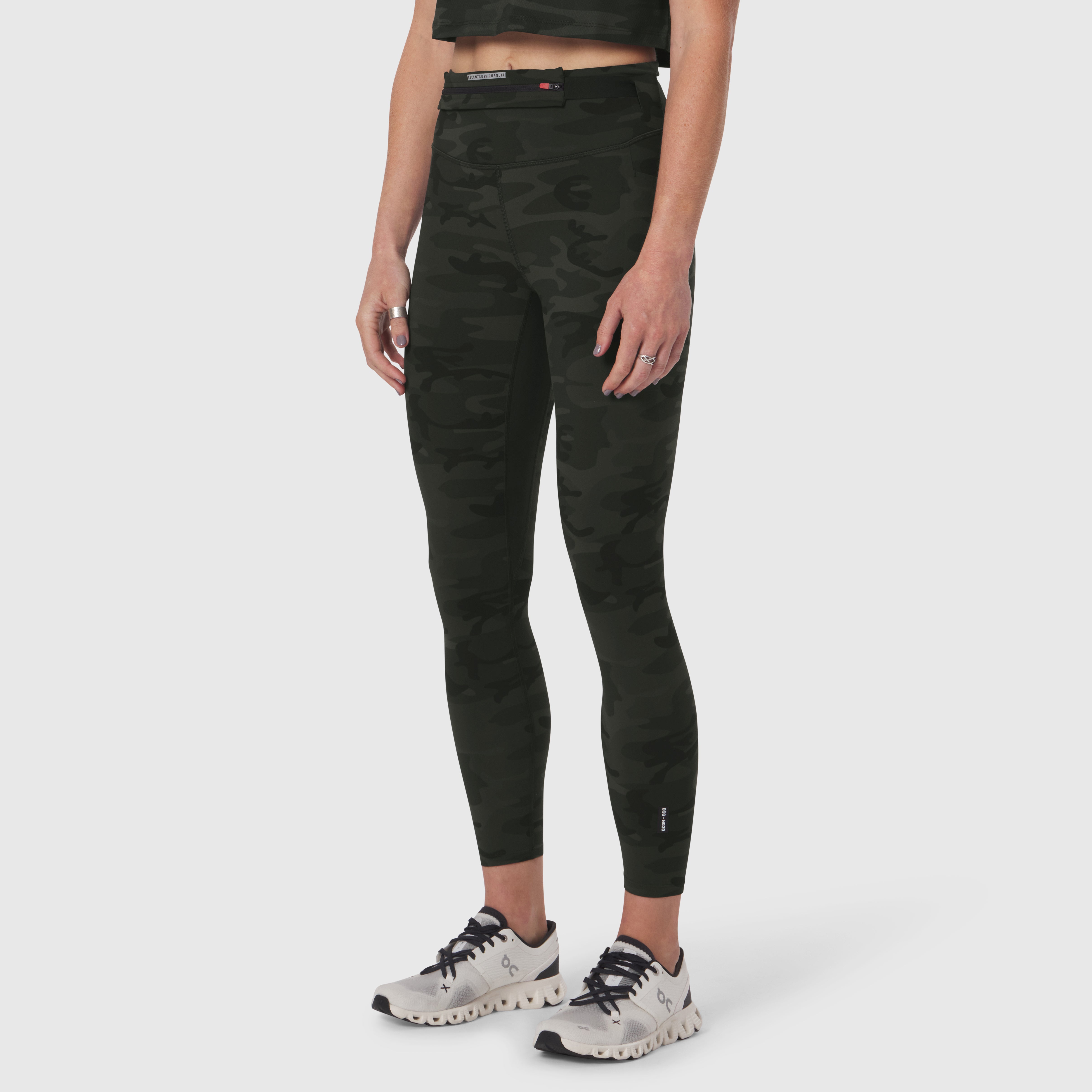 W030 LYCRA® 3-in-1 Legging in Dark Camo, model wearing cropped legging with running shoes