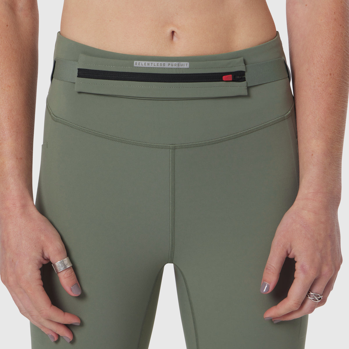 W030 LYCRA 3-in-1 Legging in sage, worn by model from waist down, front view