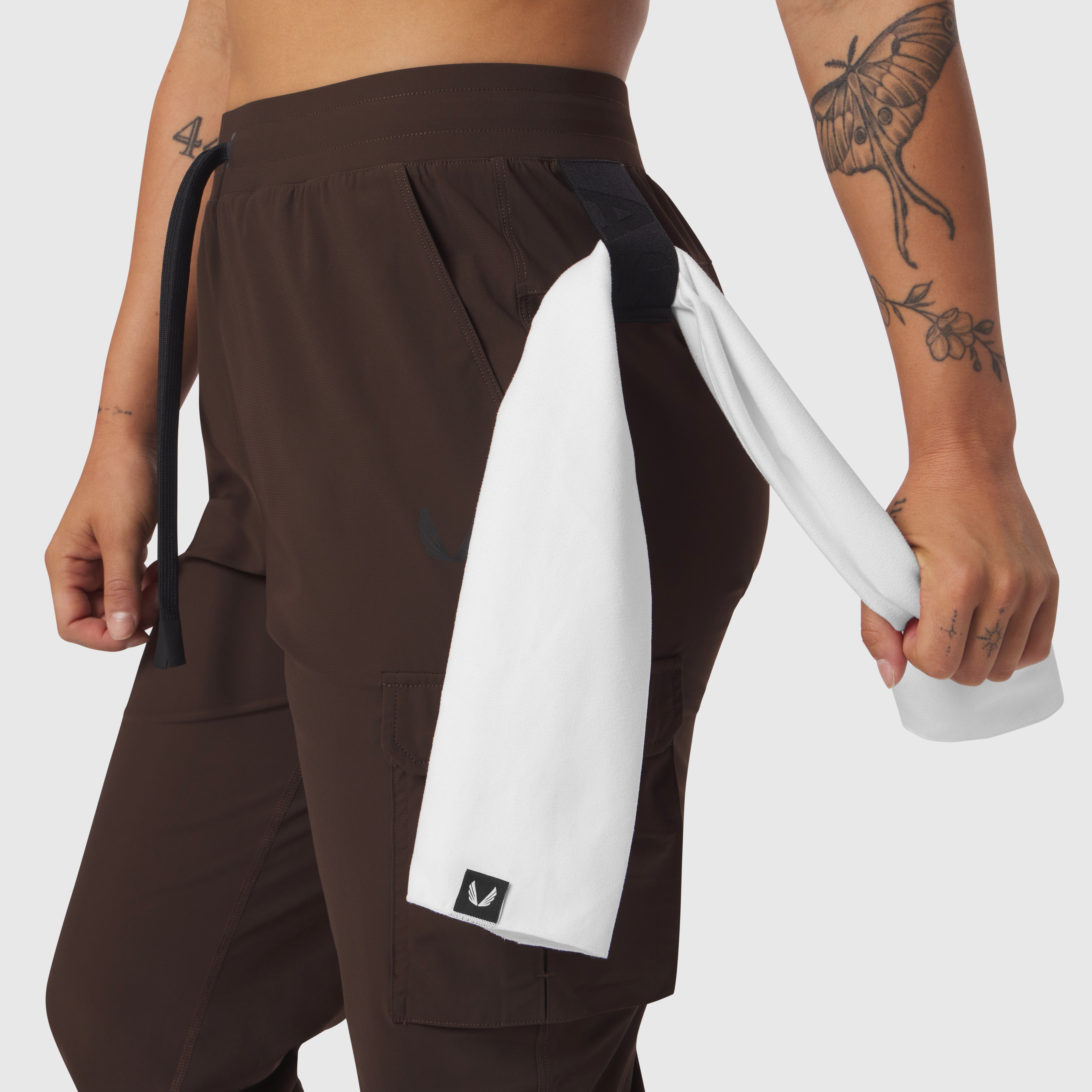 Tetra-Lite Cargo High Rib Jogger in Dark Earth with white side panel, worn by model