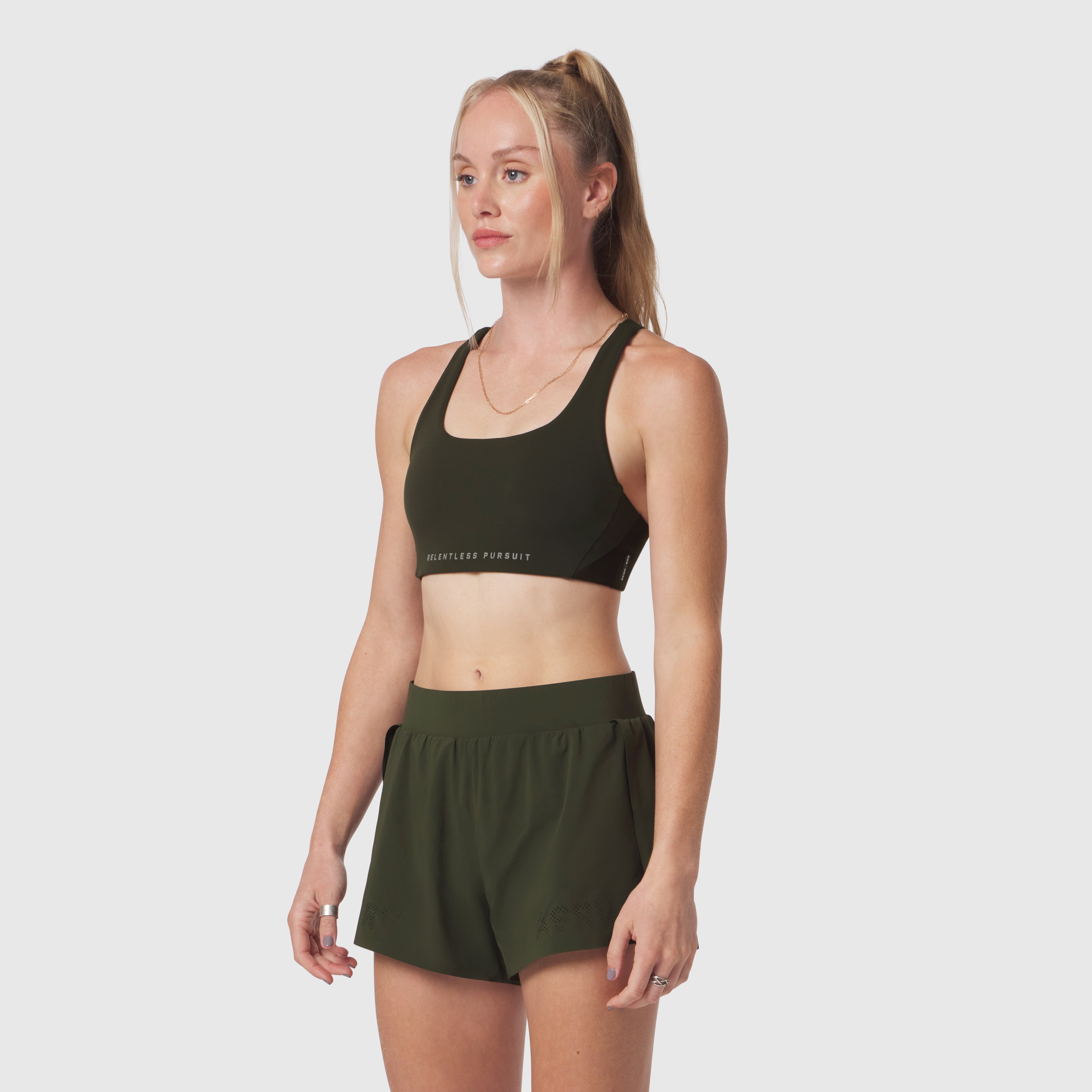 W039 Lycra Hybrid Sports Bra in olive, worn by model front view