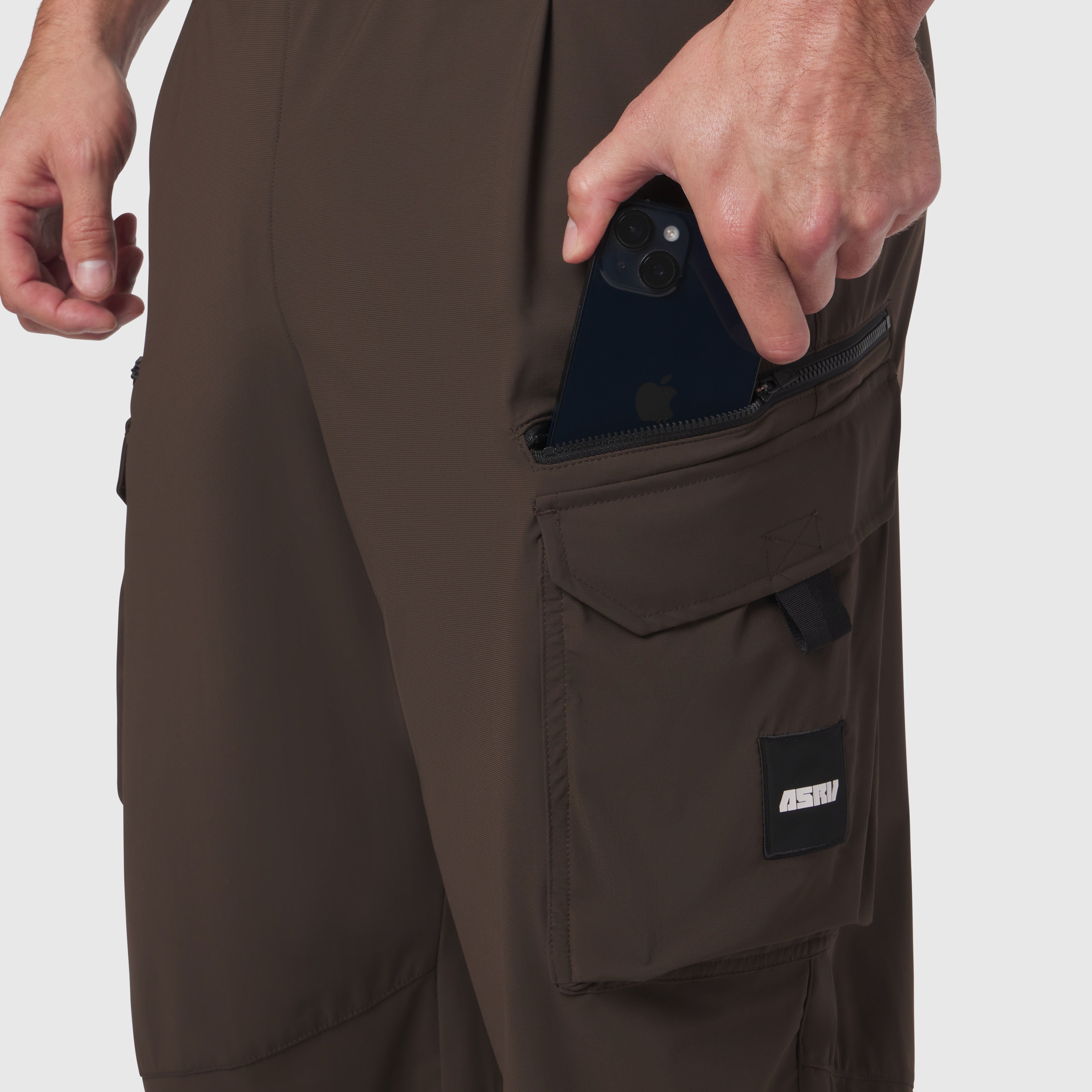 Tetra-Lite Cargo City Pant in Dark Earth worn by model, showing phone pocket detail