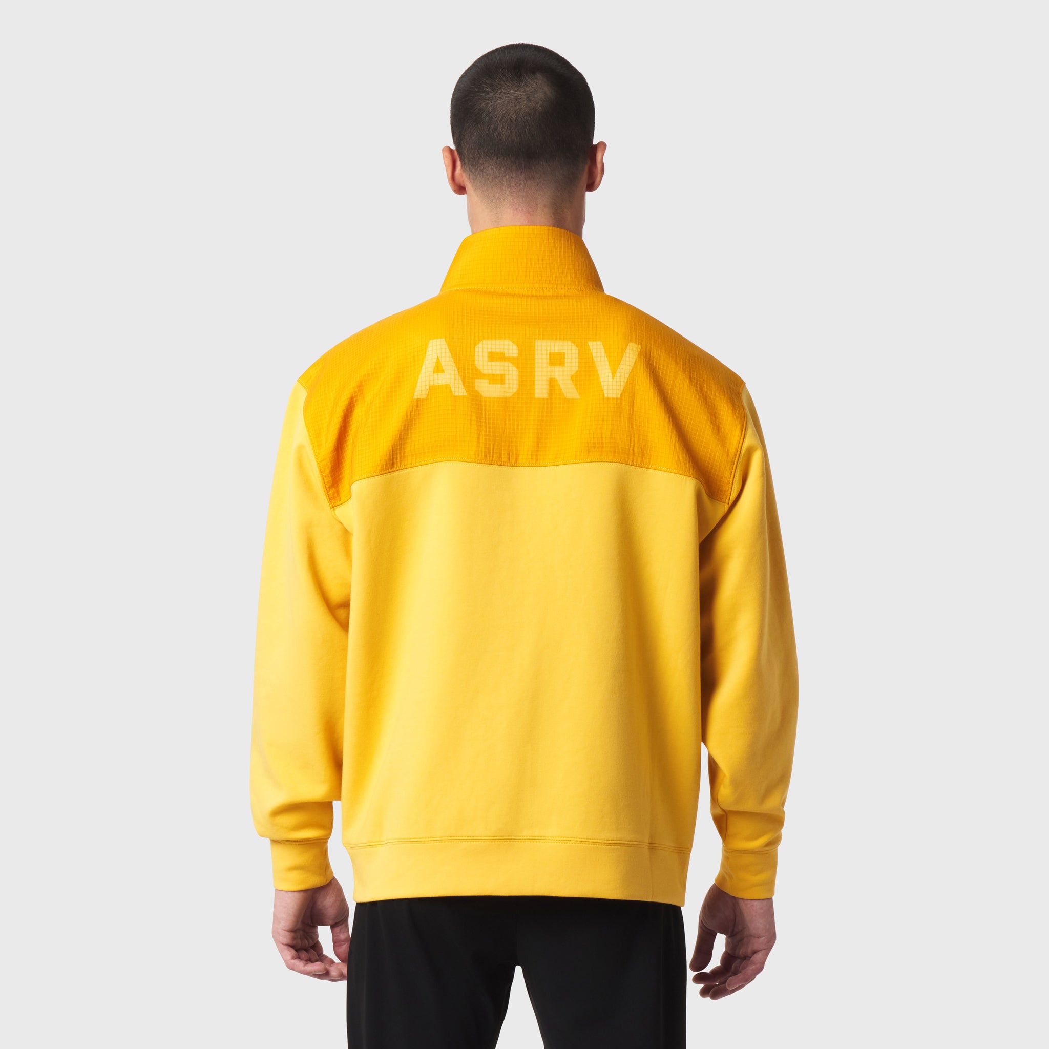 Dri-Core Sidelock Full Zip in amber yellow, back view on model