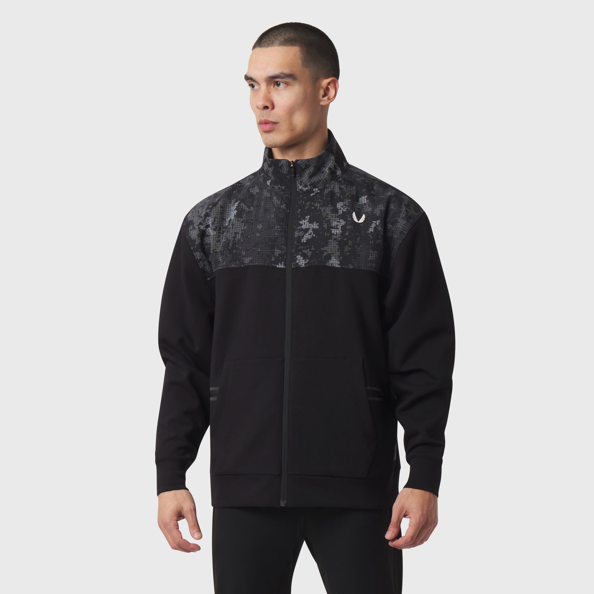 Dri-Core Sidelock Full Zip jacket in black with patterned chest panel, worn by model