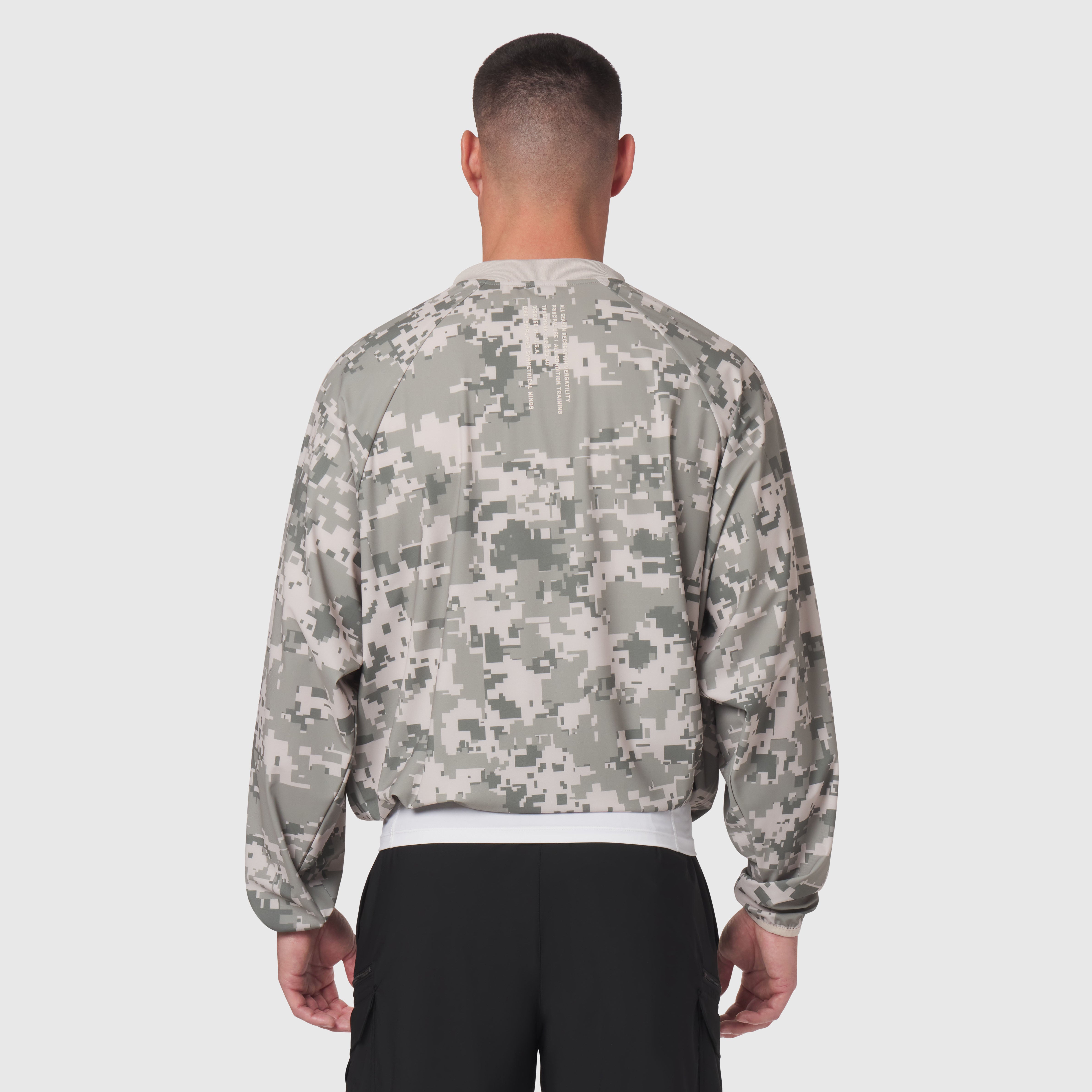 Tetra-Lite Blade Collar Zip Jacket in digital camo, back view on model