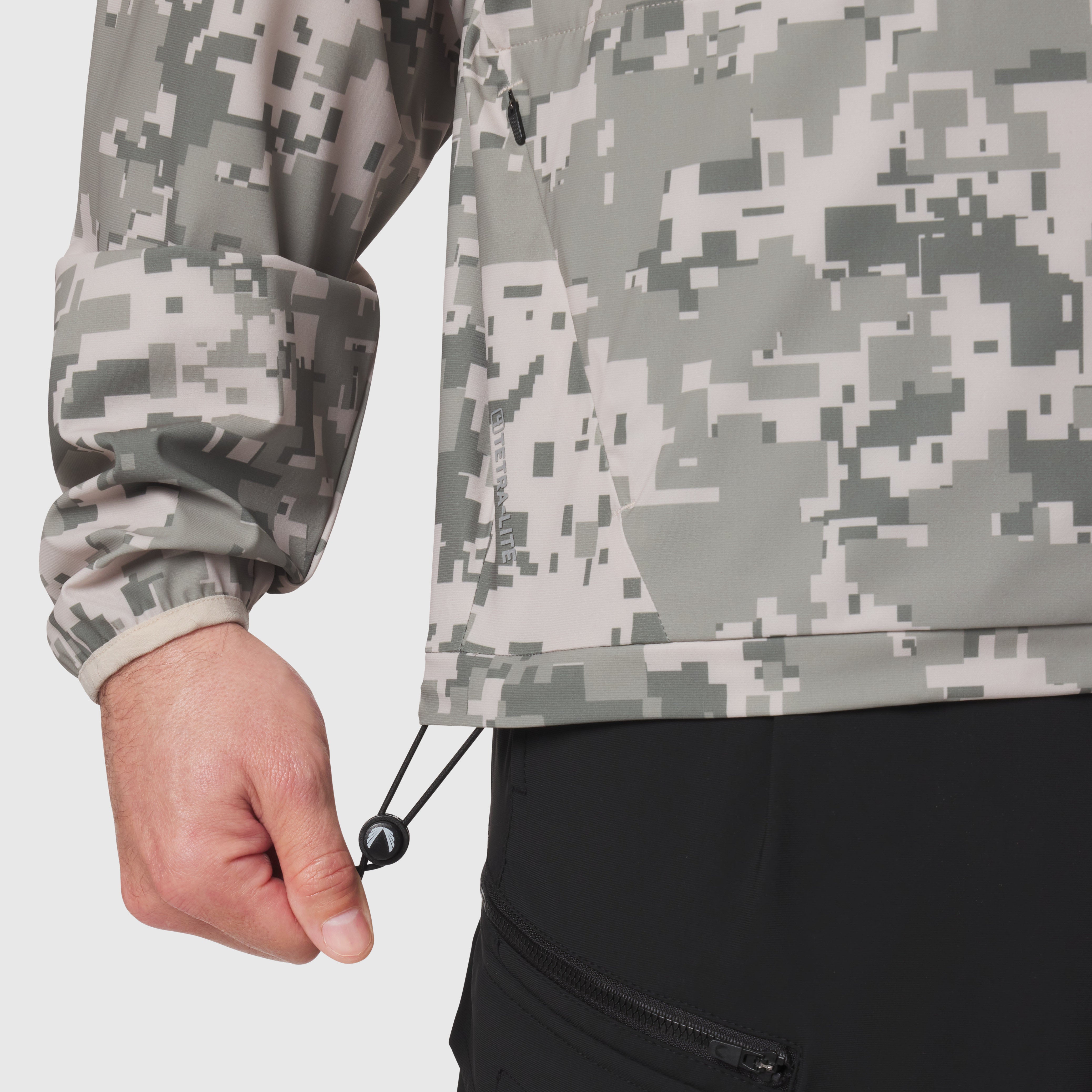 Tetra-Lite® Blade Collar Zip Jacket in digital camo, worn with hand adjusting drawcord