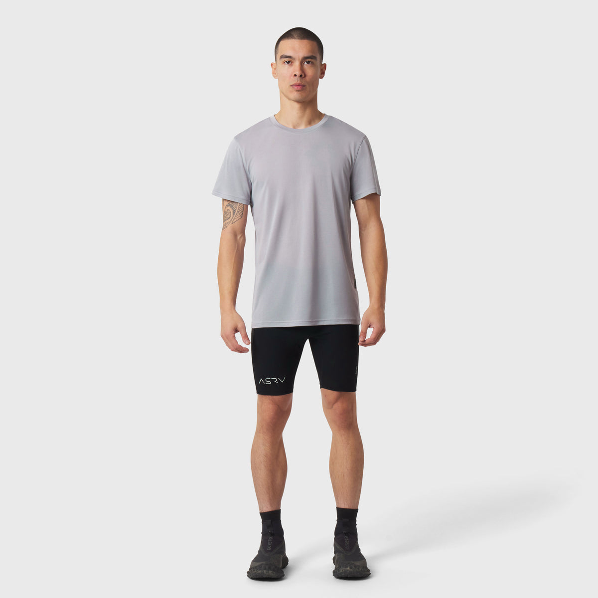 Polartec® Delta Training Tee in slate grey worn with black shorts, front view on model
