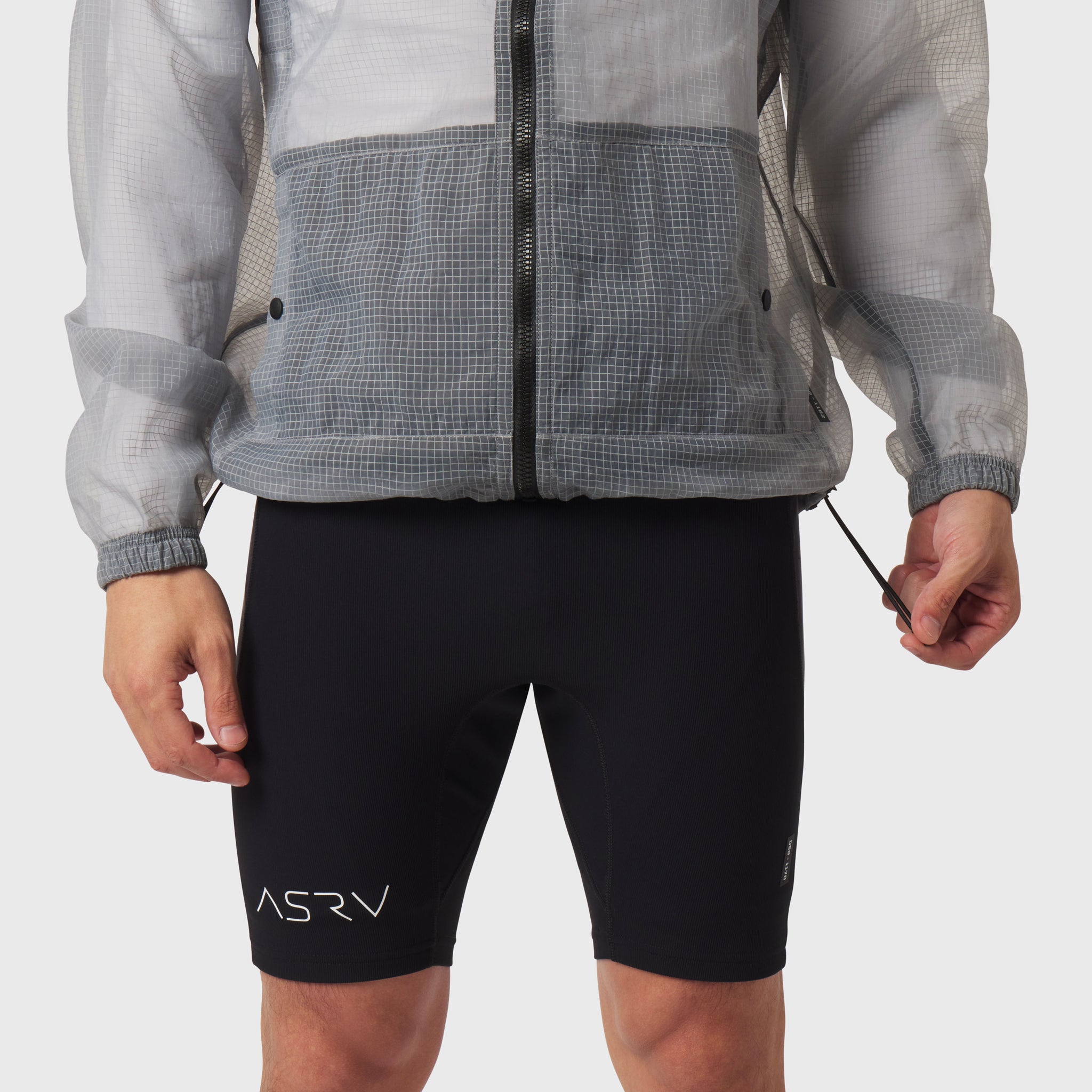Weather-Ready Transparent Ripstop Shell Jacket in slate grey worn with black shorts, front view