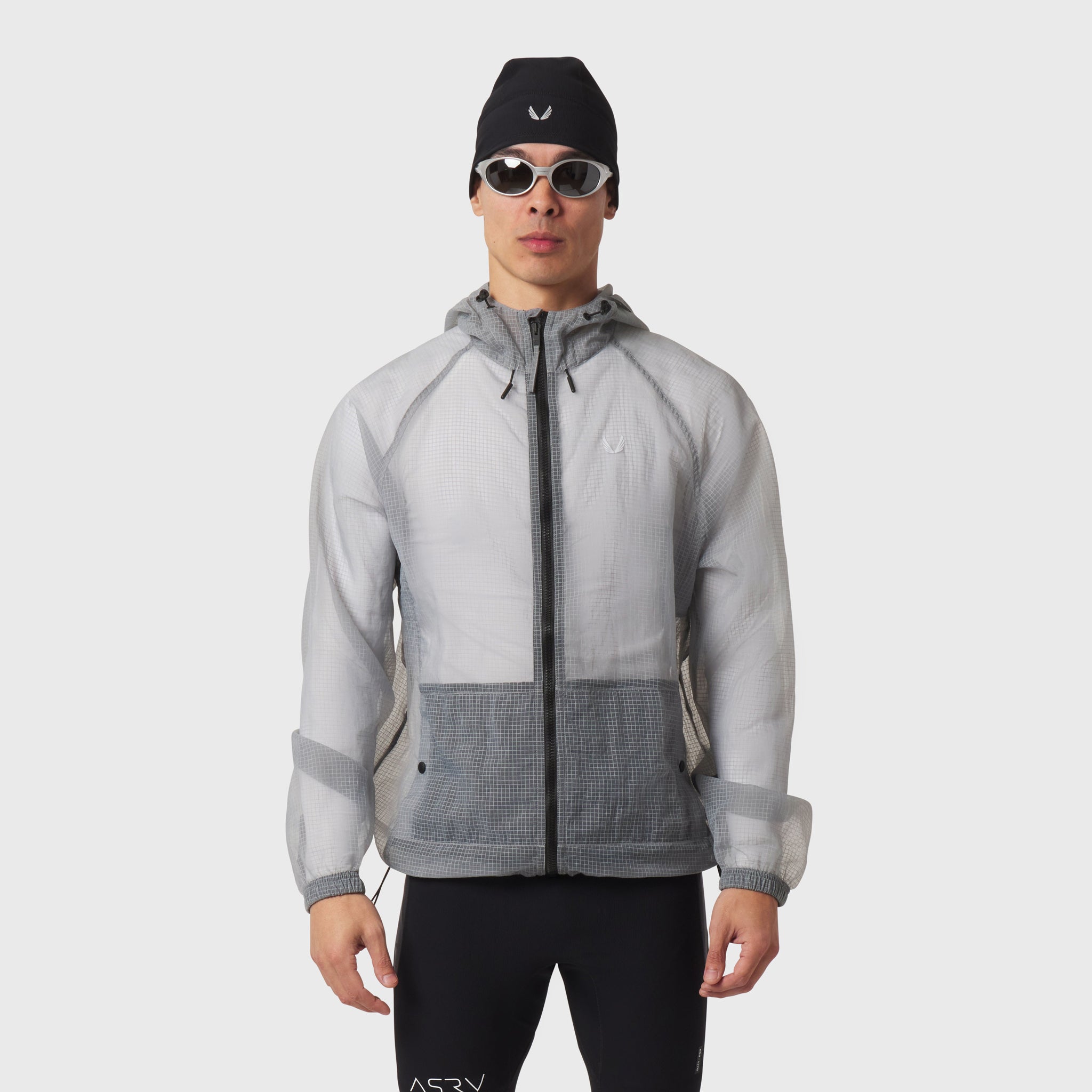 Weather-Ready Transparent Ripstop Shell Jacket in slate grey, worn by model with hood up