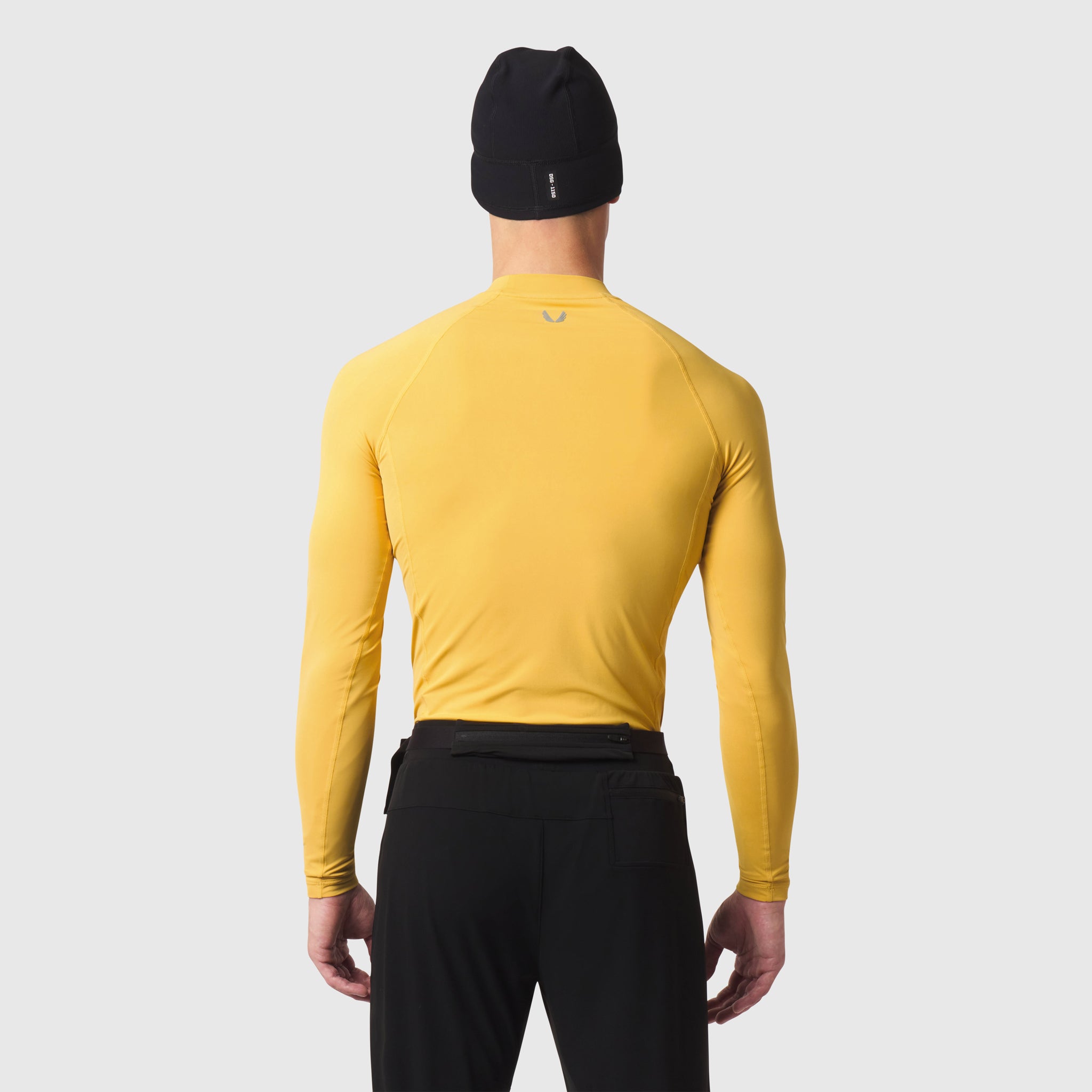 LYCRA® ADAPTIV Baselayer Longsleeve in amber yellow, back view on model