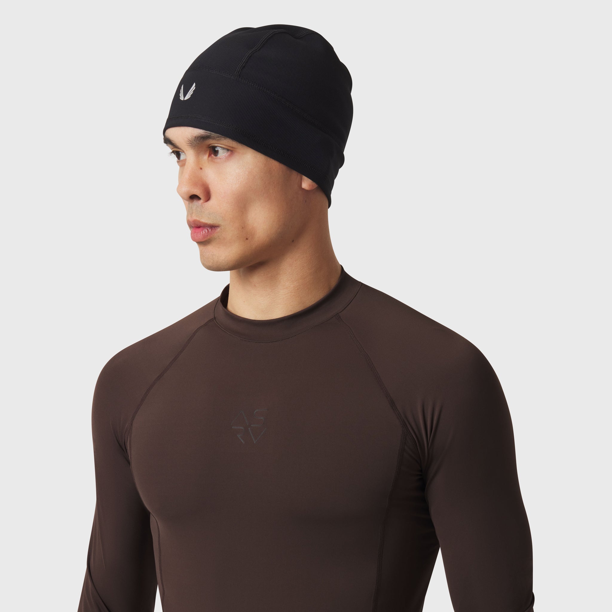 LYCRA® ADAPTIV Baselayer Longsleeve in dark earth worn by model, side profile view