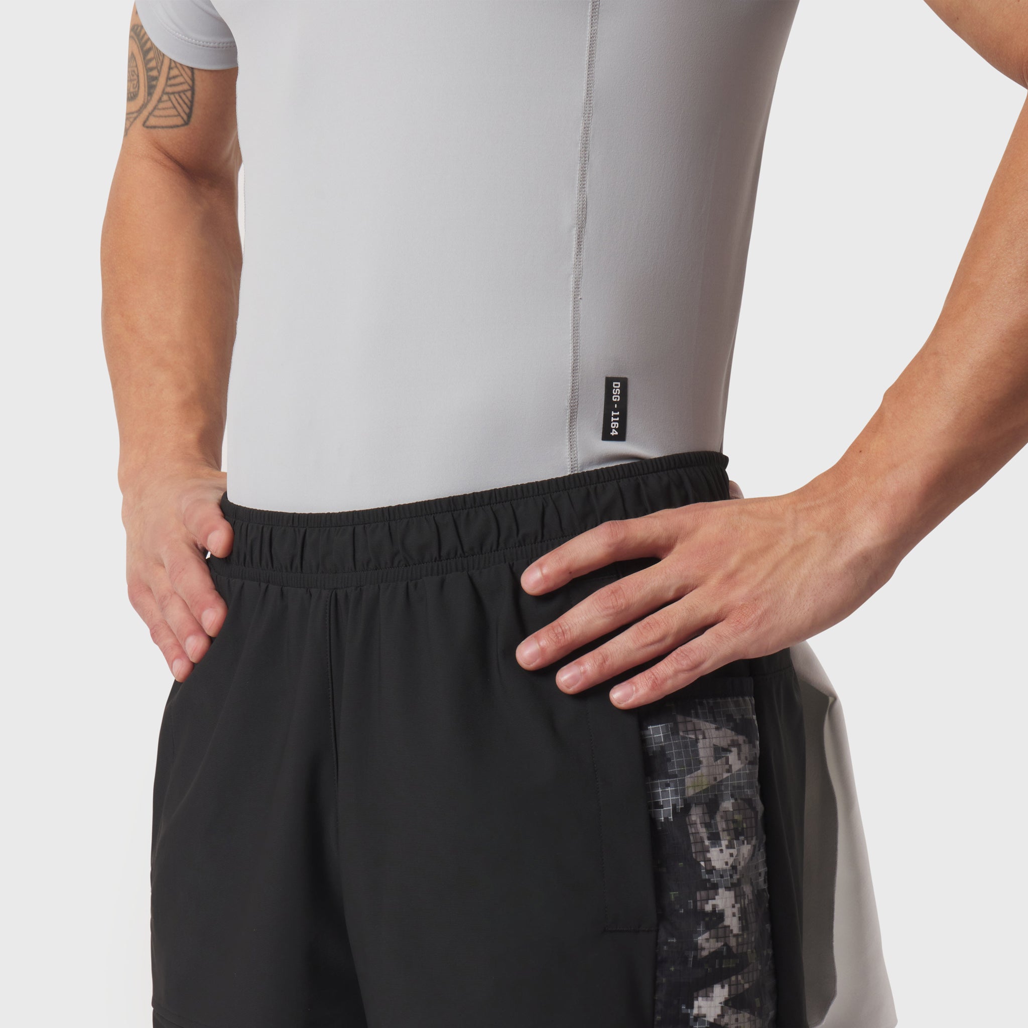 LYCRA® ADAPTIV Baselayer Shortsleeve in slate grey, worn by model showing fit at torso