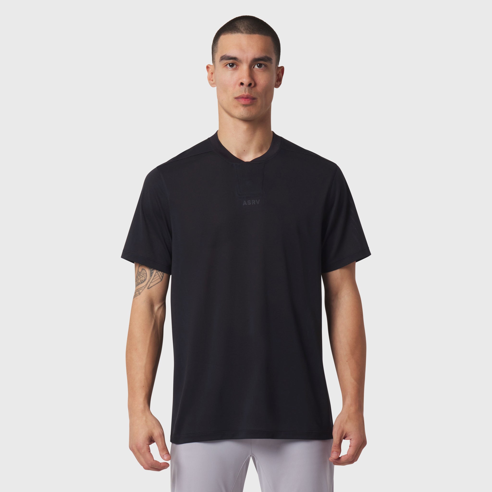 Black v-neck t-shirt on male model, front view