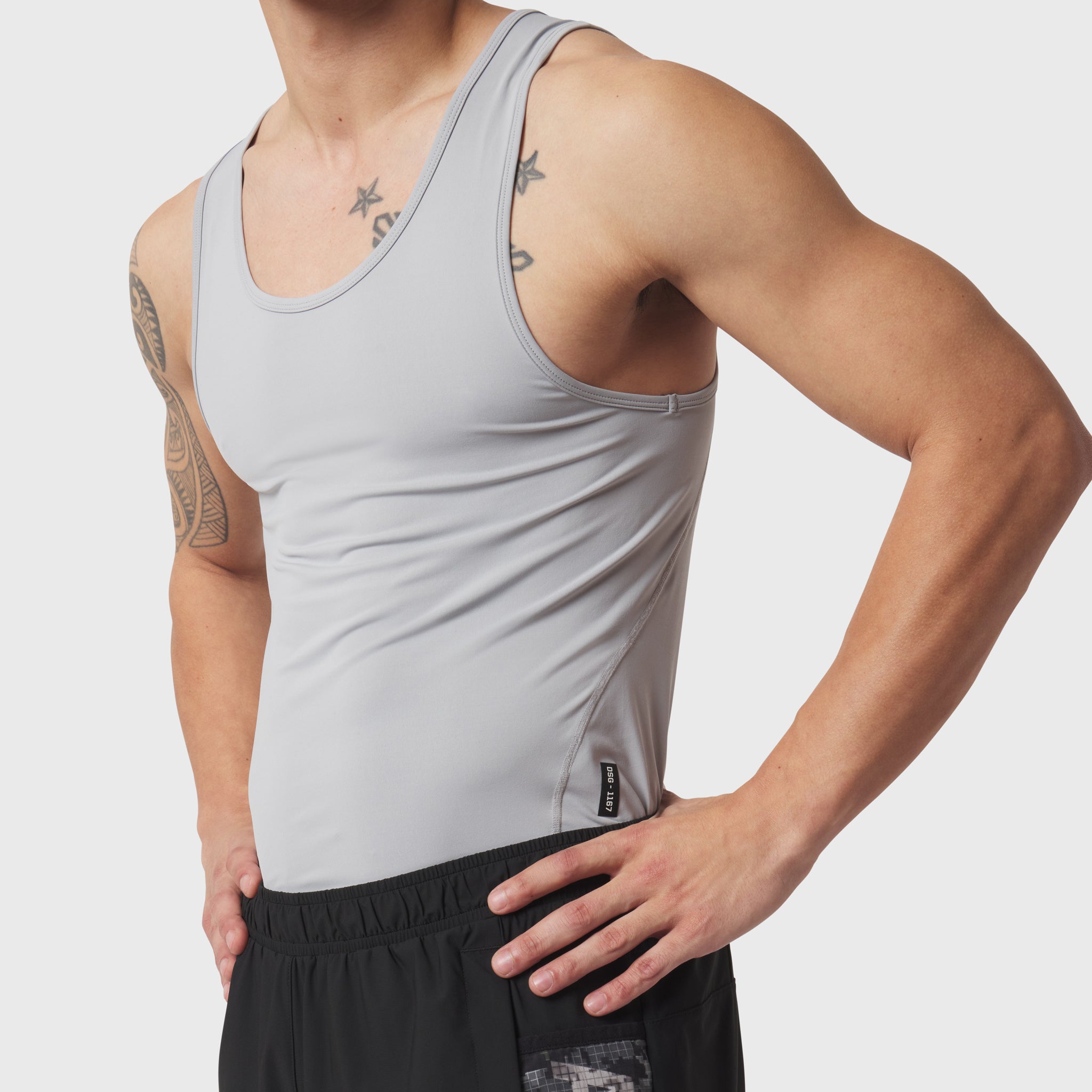 LYCRA® ADAPTIV Baselayer Tank in slate grey worn by model, front view