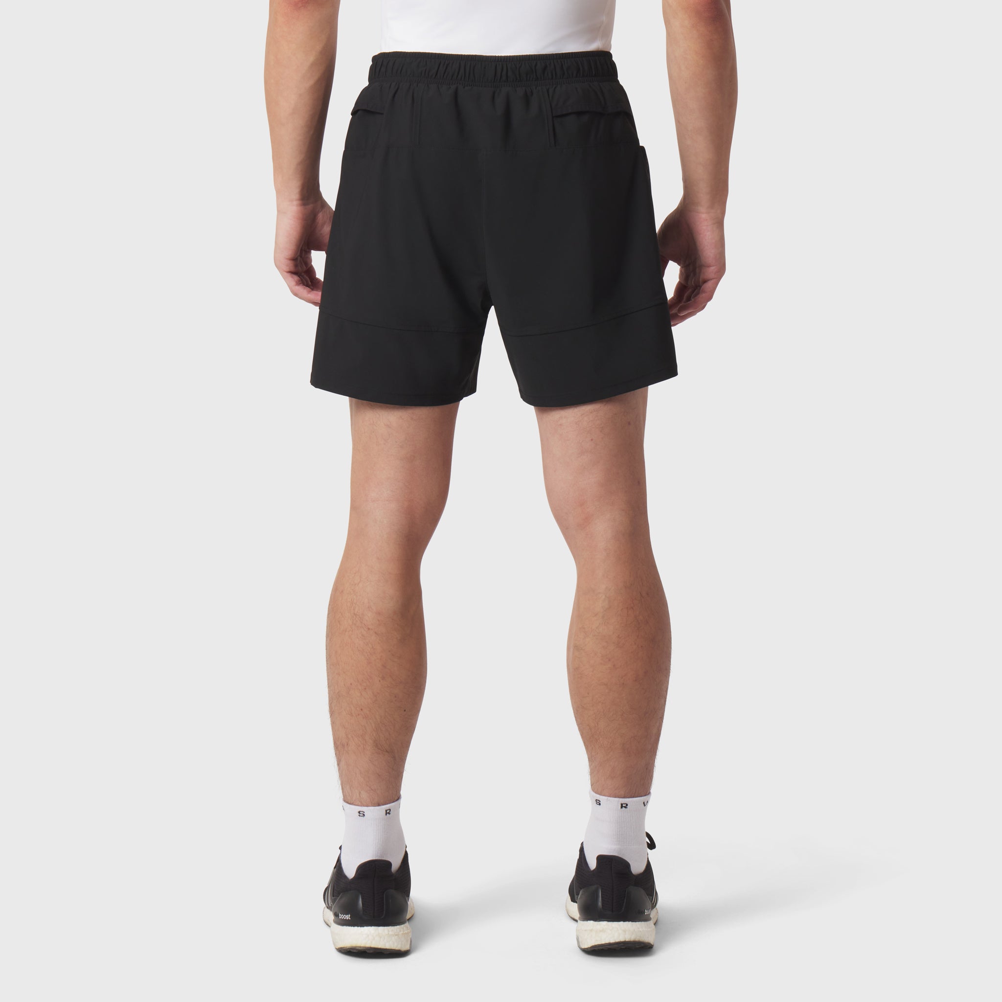 Black Tetra-Lite Adventure Short worn by model, back view
