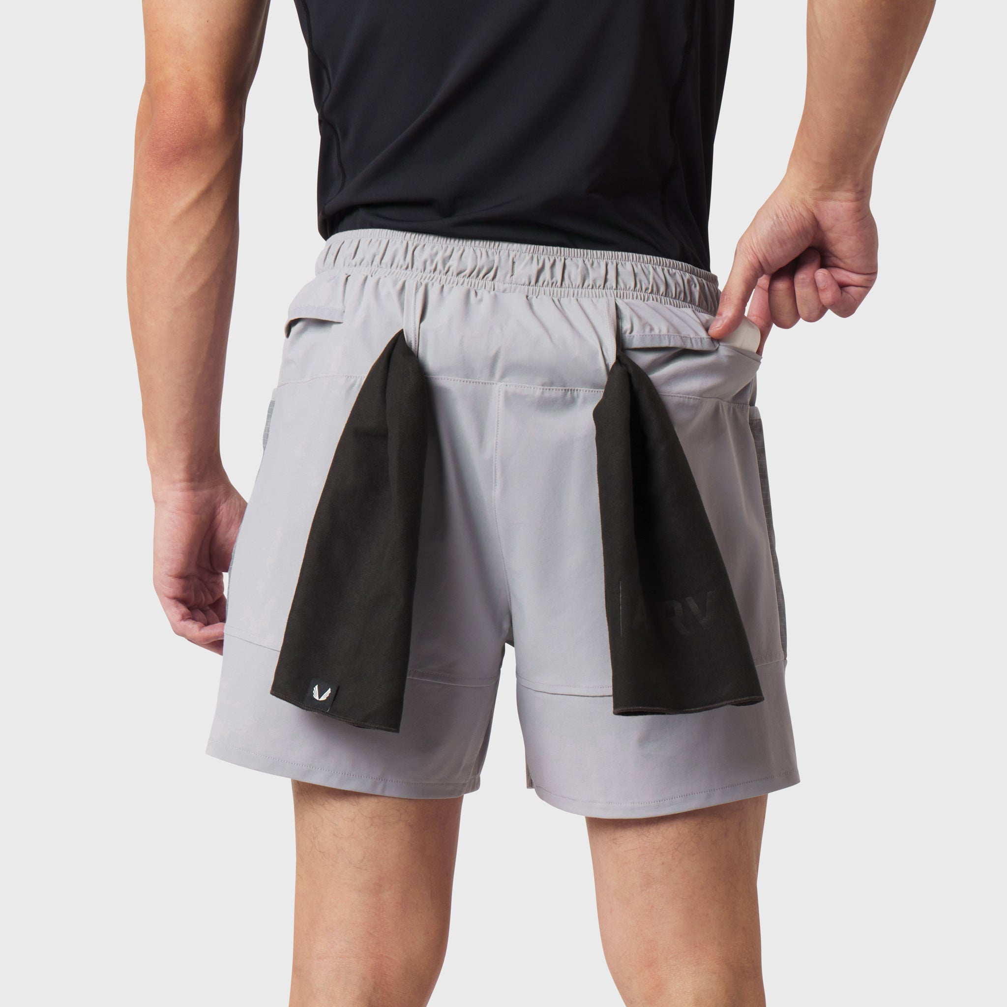 Tetra-Lite Adventure Short in slate grey worn by model, back view showing black side panels