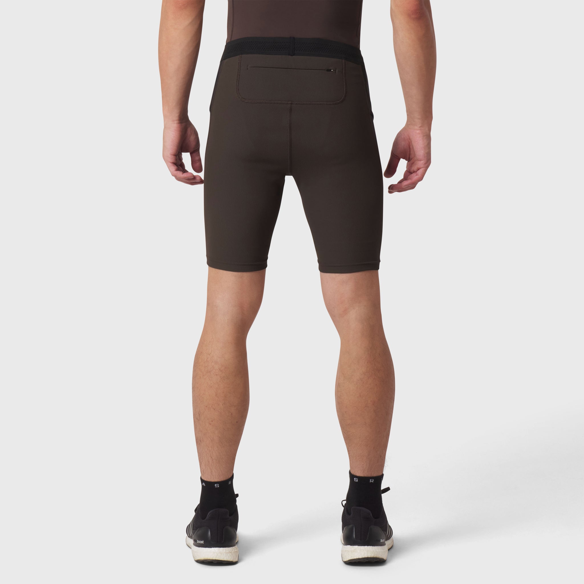 Lycra® Ribbed Run Half-Tight in Dark Earth, back view on model