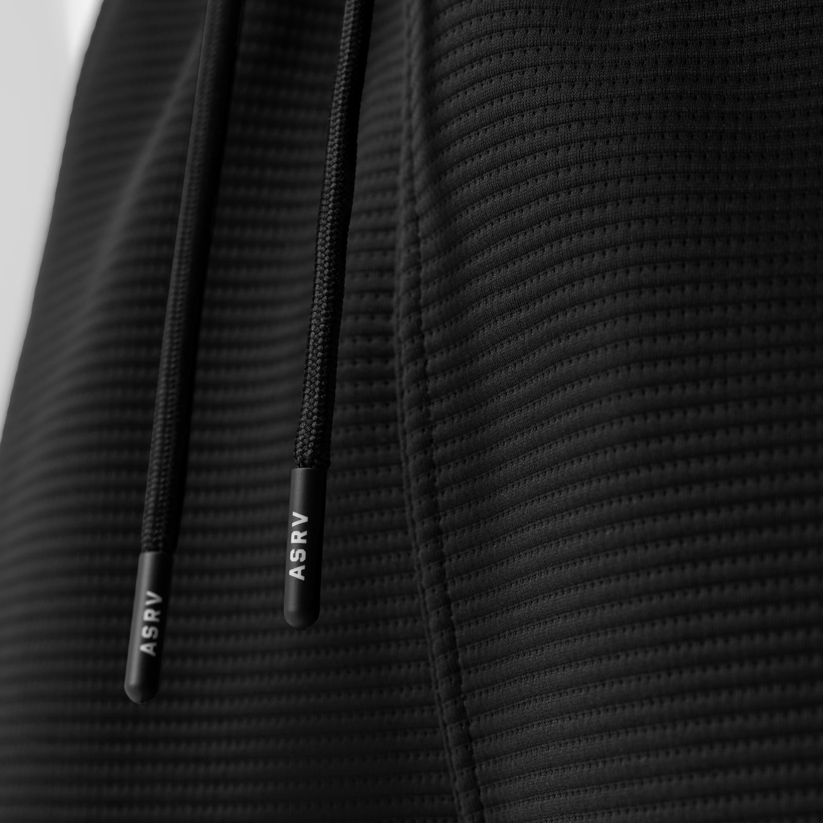 Deltapeak® Cargo Cinch Jogger in black, drawstring detail closeup