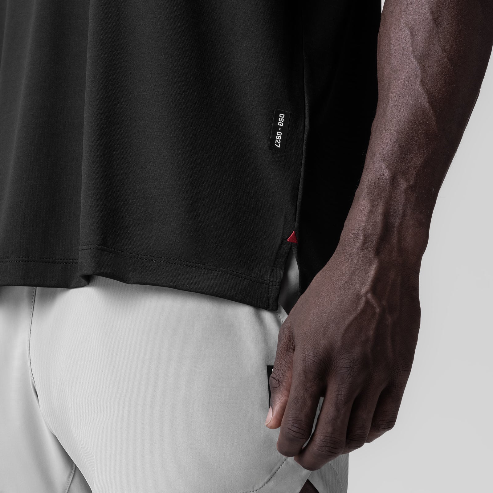3D-Lite® 2.0 Lycra® Relaxed Cutoff in black, worn with white pants, side detail view