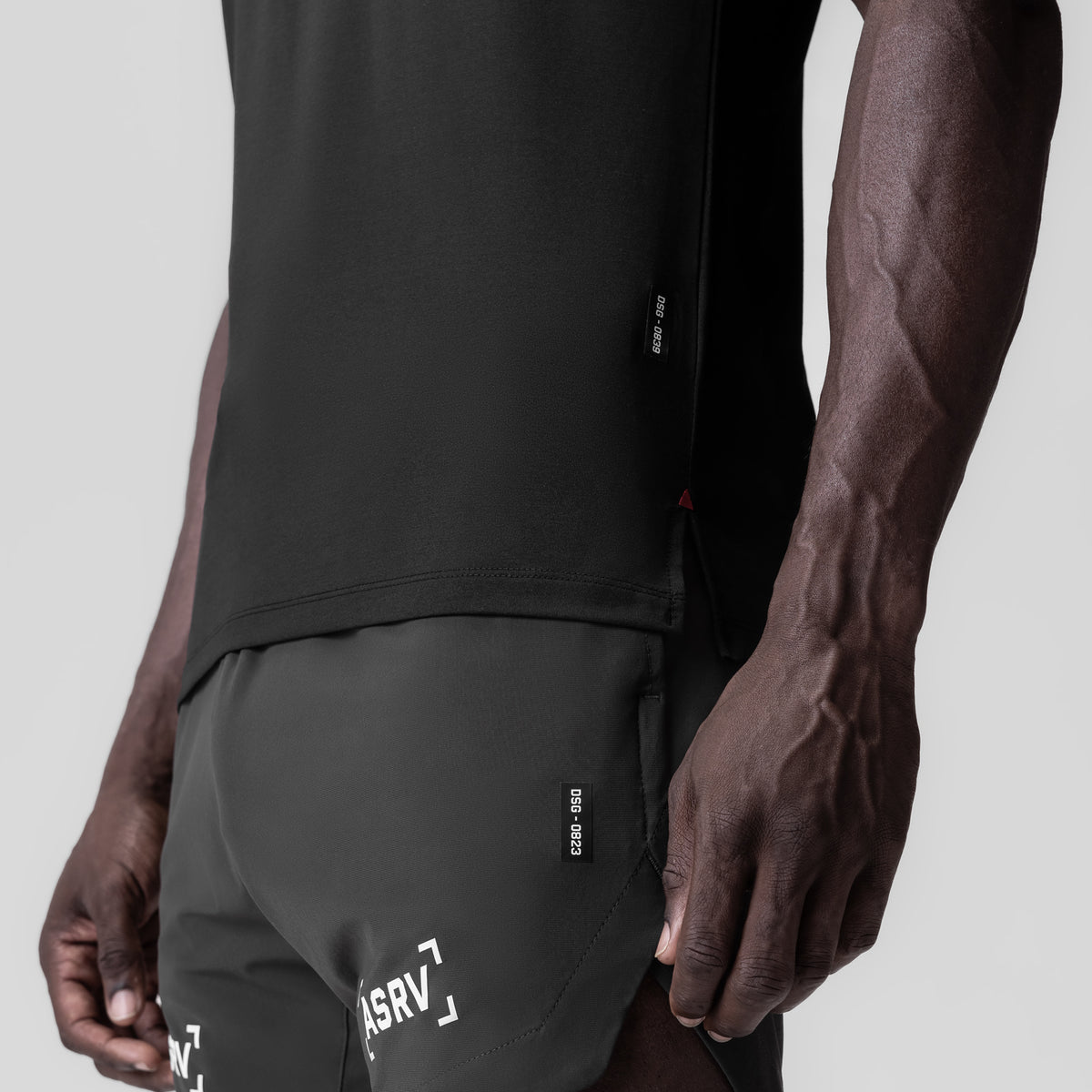 Black 3D-Lite® 2.0 Lycra® Fitted Tee with Brush Wings design, side view on model