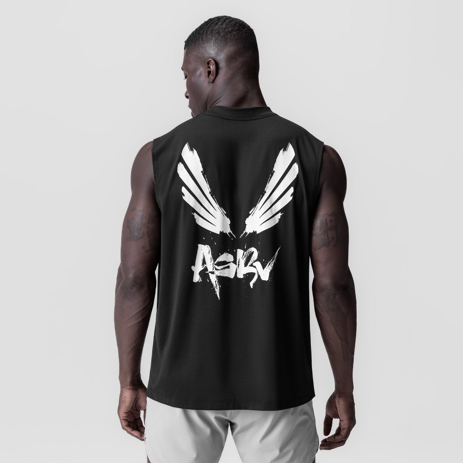 Black 3D-Lite® 2.0 Lycra® Relaxed Cutoff with white brush wings graphic, back view on model