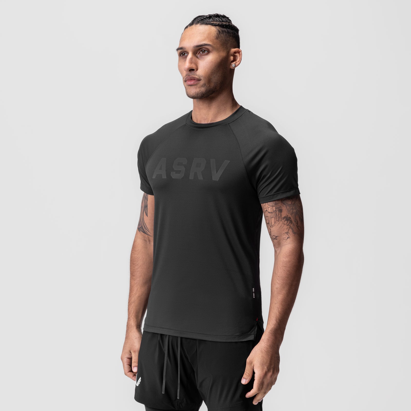 AeroSilver Fitted Tee in black worn by male model, front three-quarter view