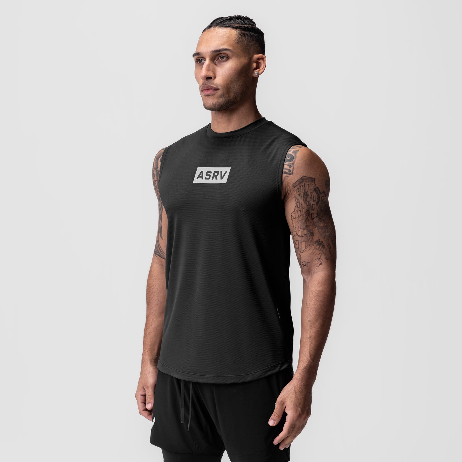 AeroSilver Cutoff Tank in black with box logo, worn by model, front view