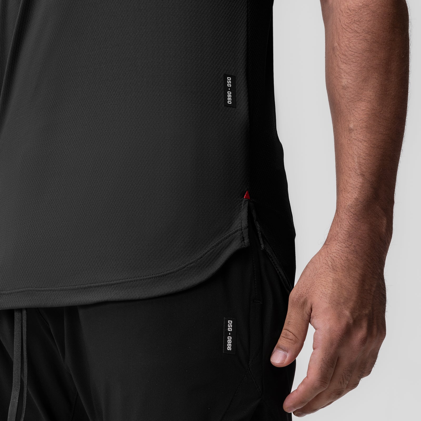 Black AeroSilver Established Tee worn by model, side view showing fit and fabric texture