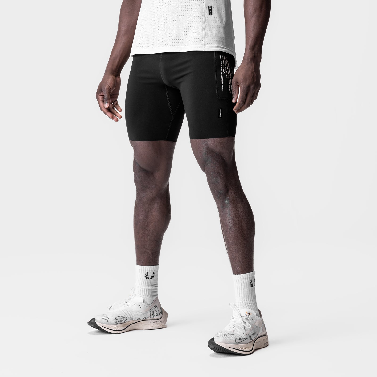 WarpFlexx® Utility Speed Short in black, worn by model standing against white background