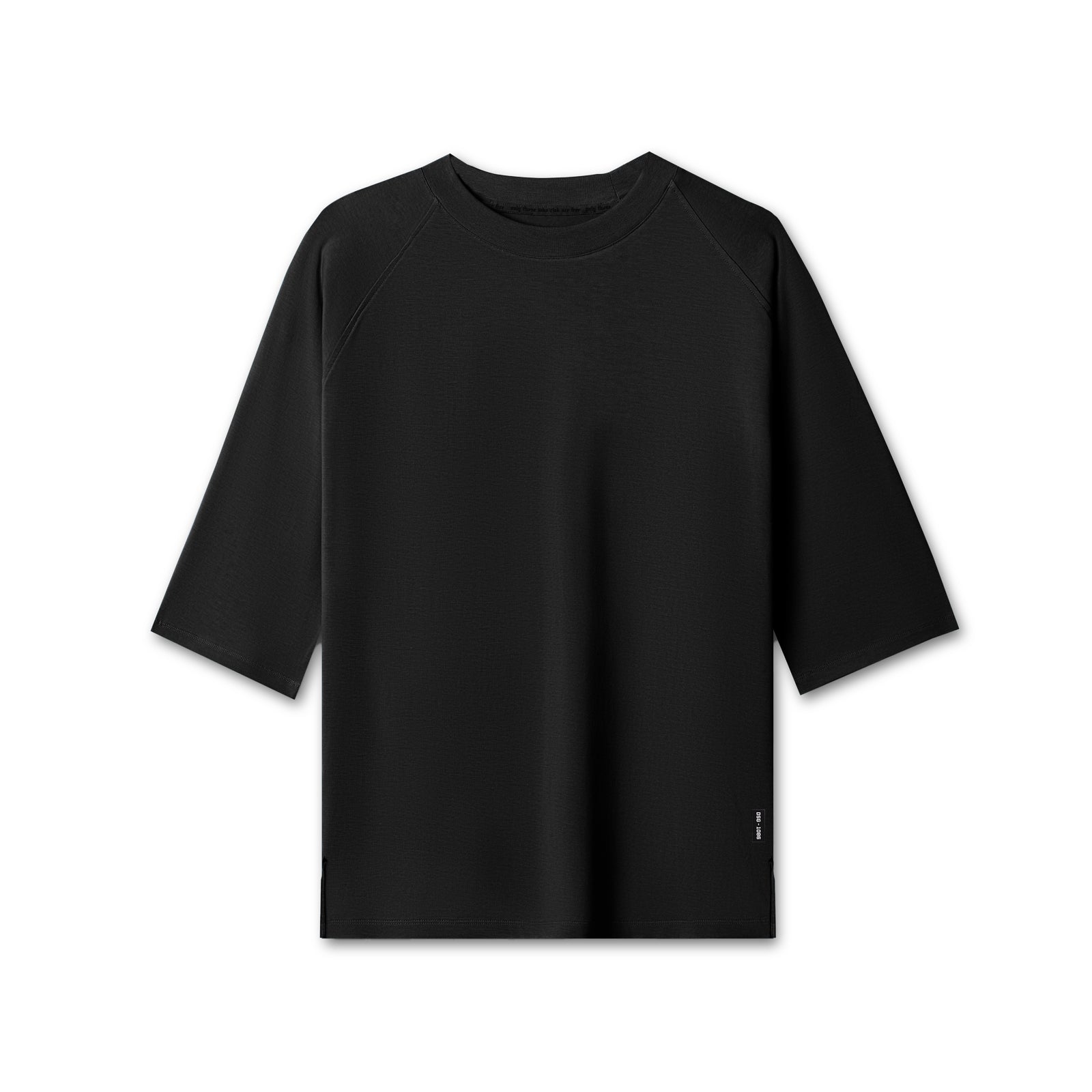 Flatlay of black Supima® 3/4-sleeve oversized tee on white background, front view