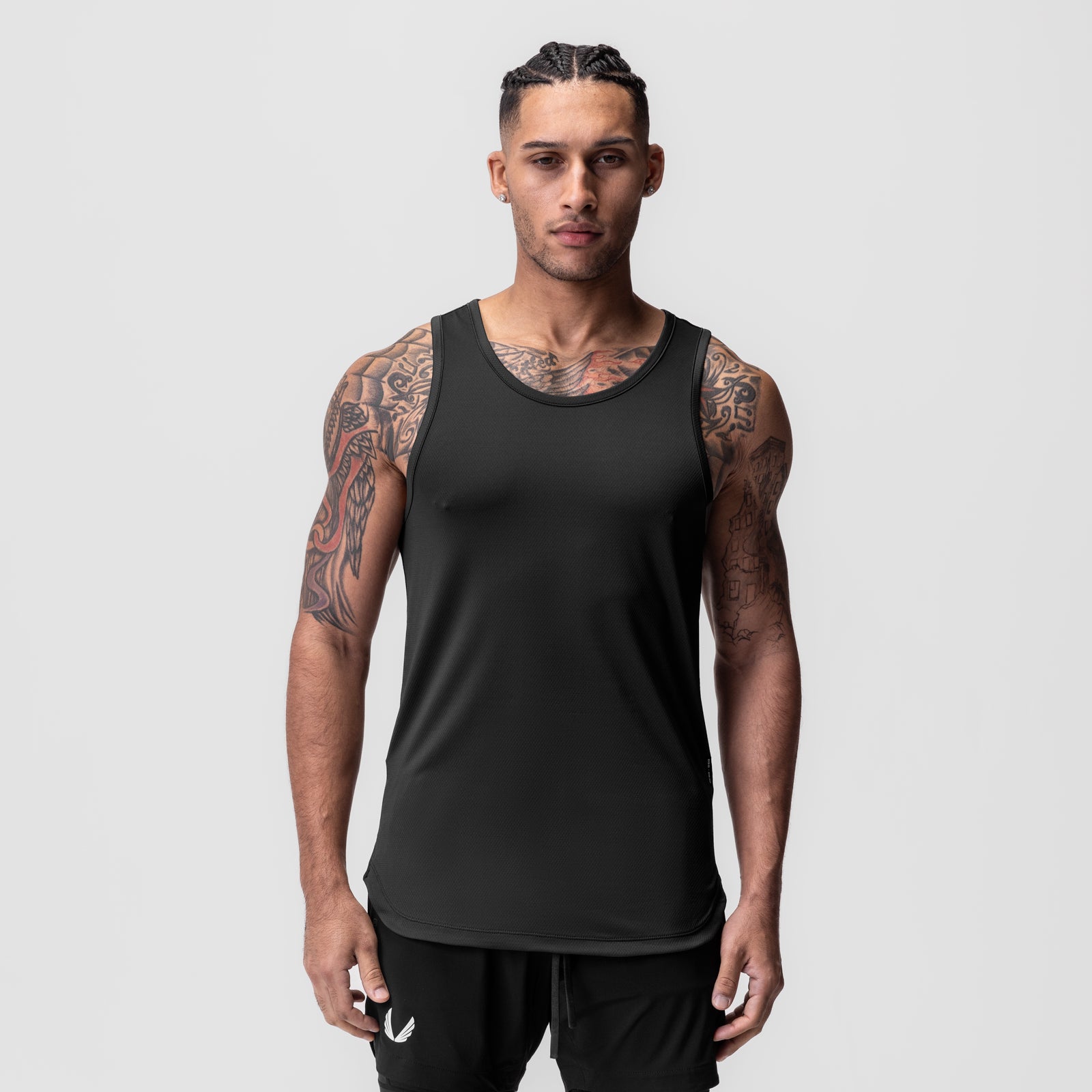 Black AeroSilver® tank top worn by male model, front view