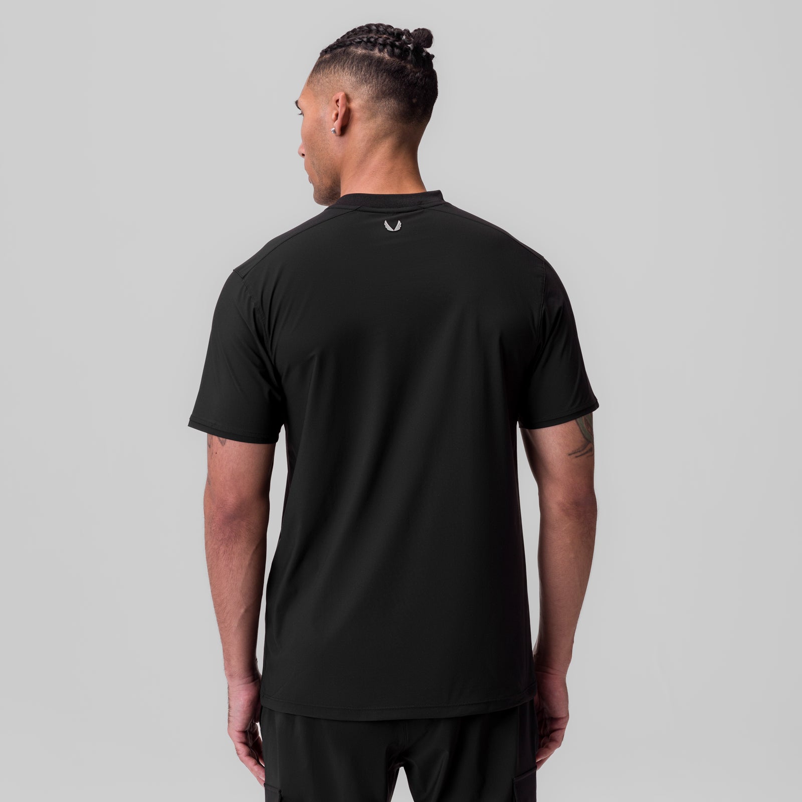Black Tetra-Lite Ice Zip Tee worn by model, back view