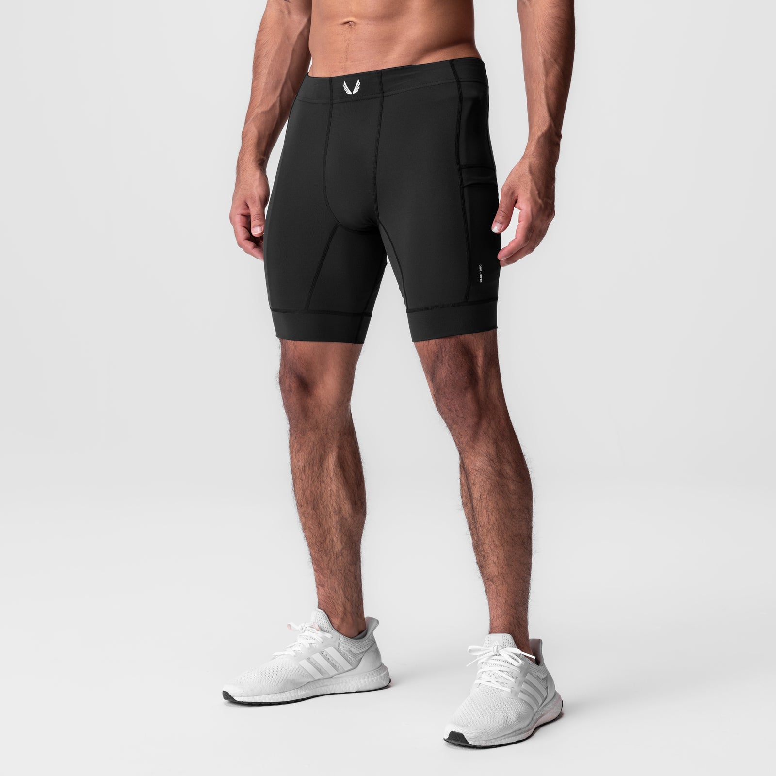 WarpFlexx-Lite 1/2-length legging in black, worn by model, front view