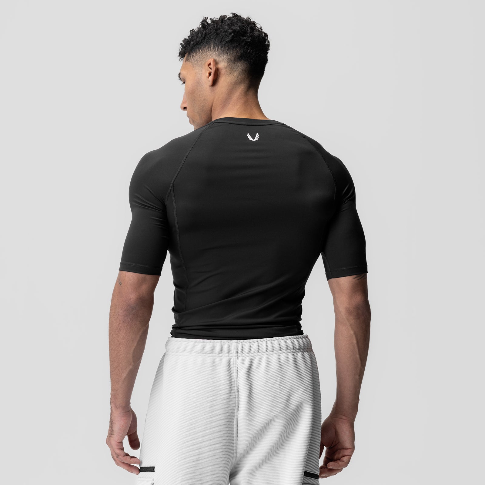 WarpFlexx-Lite® Half-Sleeve Baselayer in black, back view on model