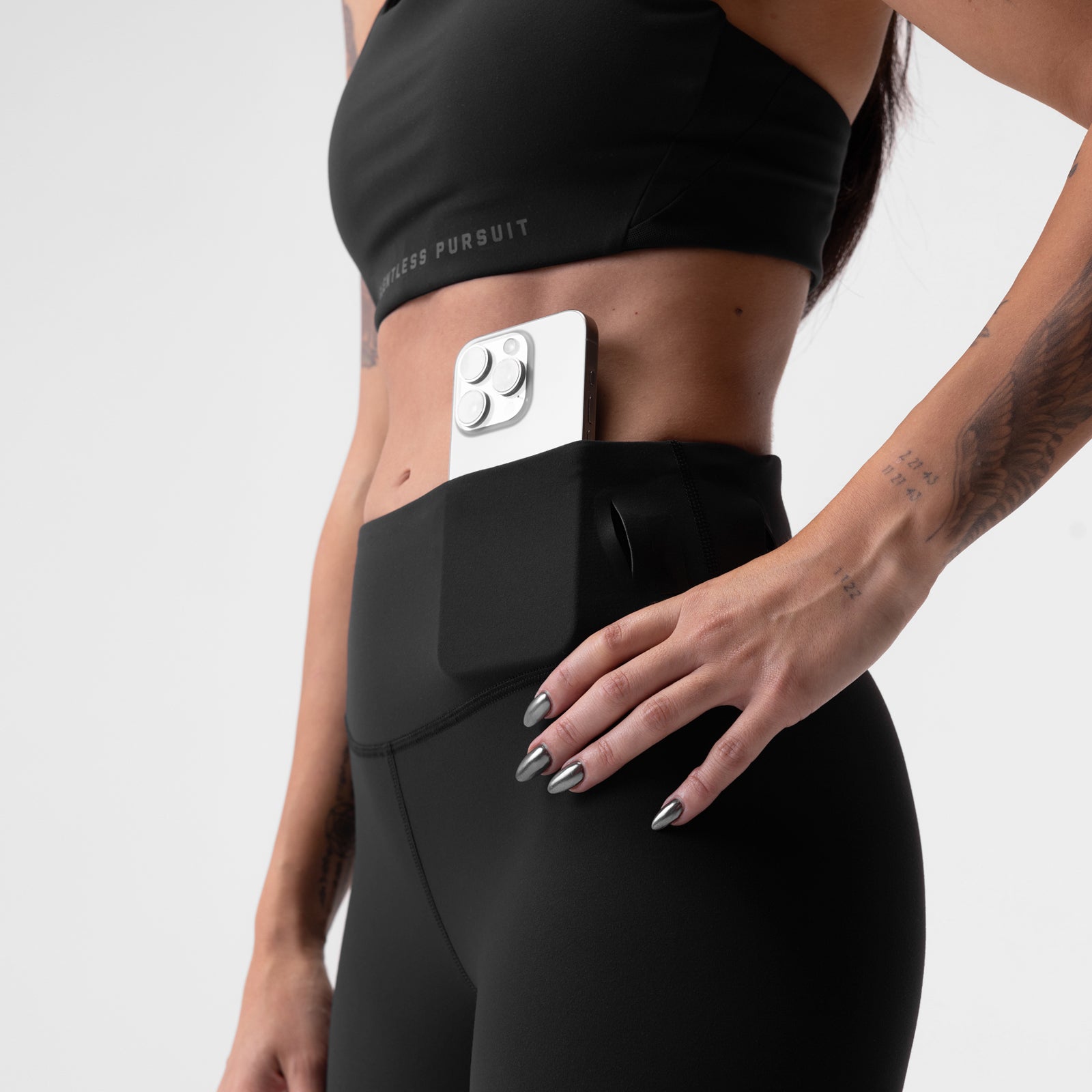 Black LYCRA® 3-in-1 Biker Short worn by model, front view with phone pocket