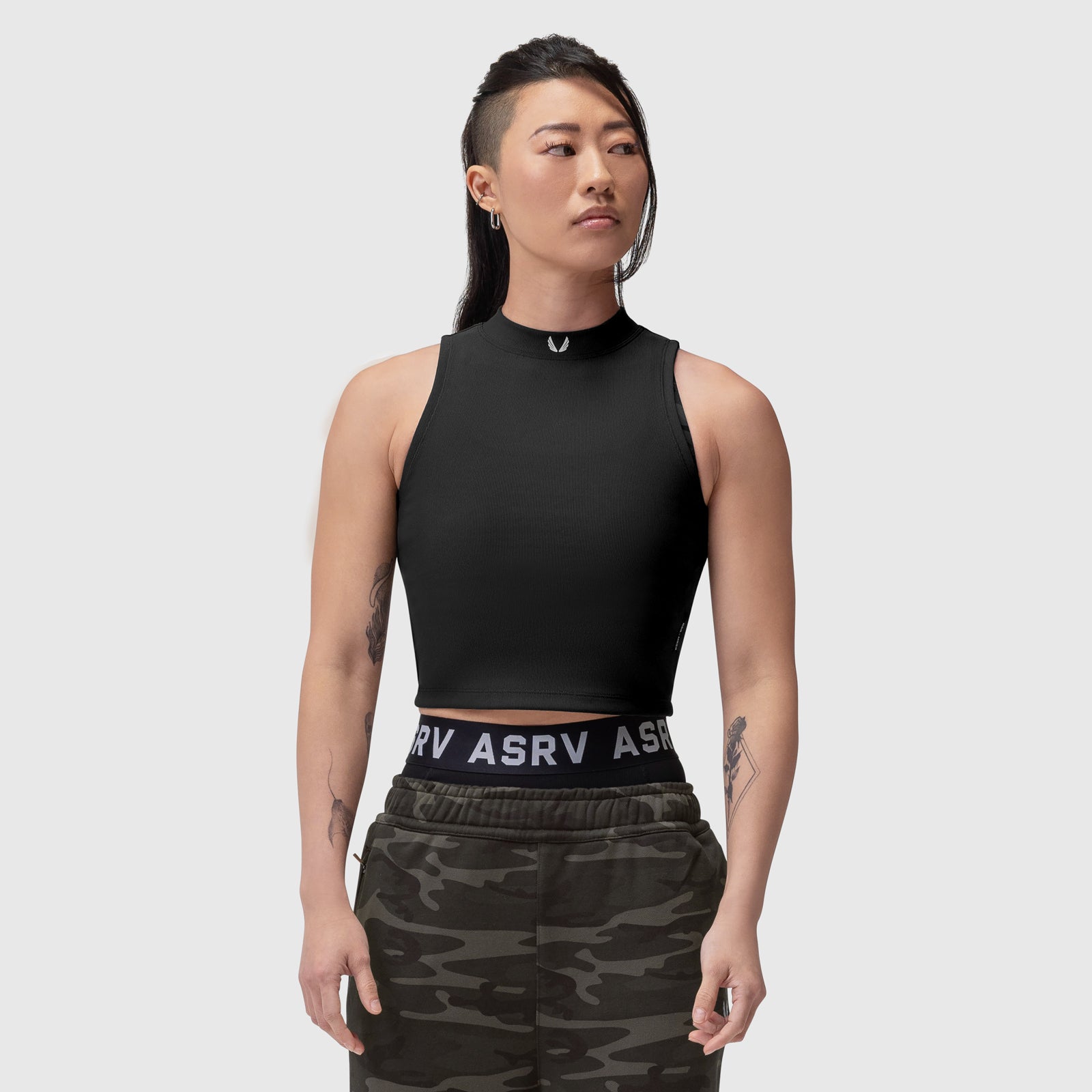 Black Lycra ribbed mockneck tank on model, front view