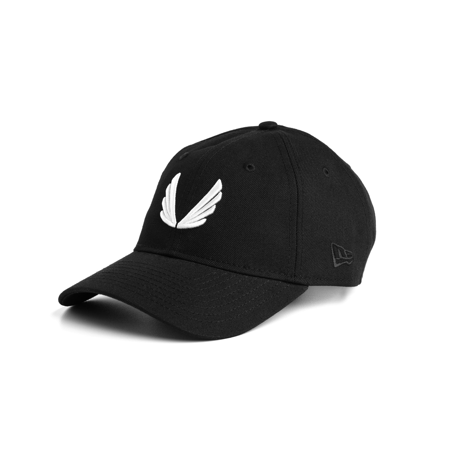 flatlay New Era 9Twenty strapback hat in black with white wing logo, angled side view